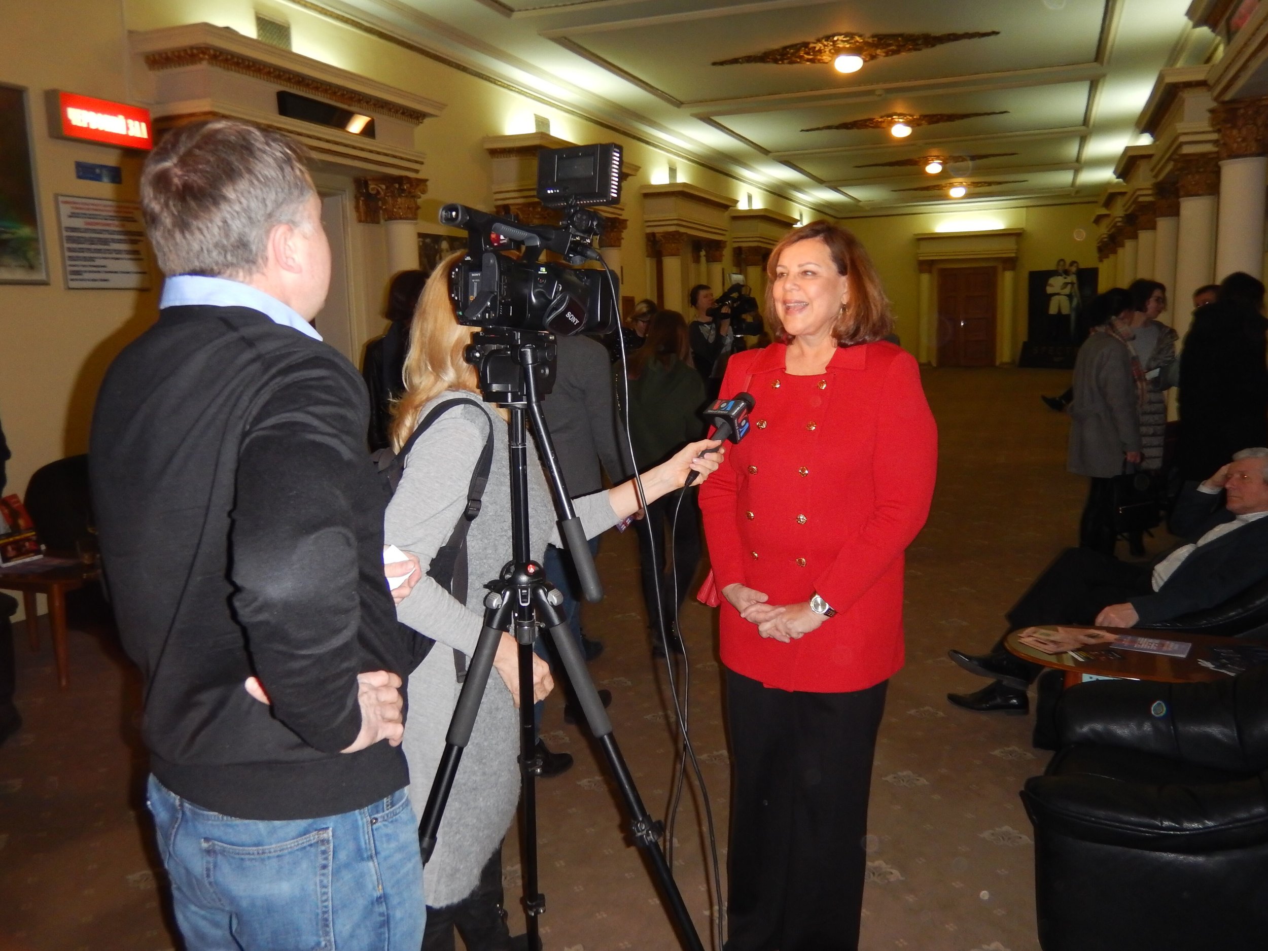 Sharon being interviewed by international press corps about her experience attending the film festival. — with American Film Showcase at Kiev.