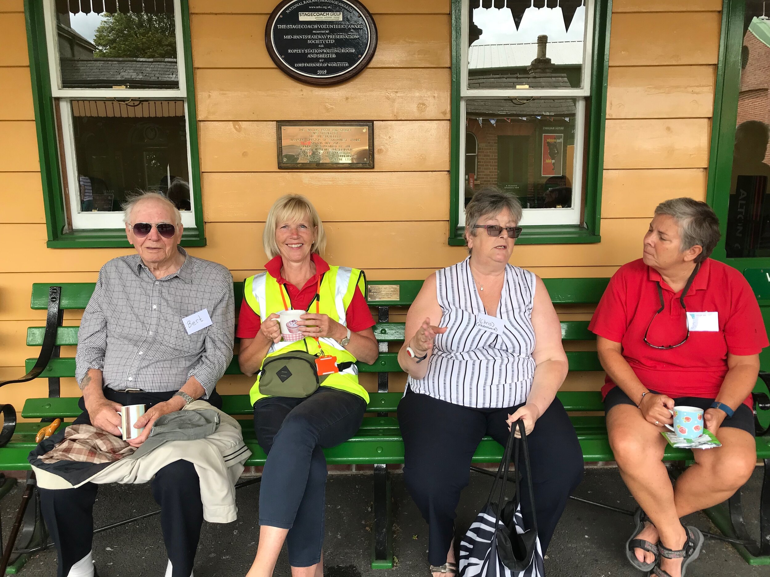 Fort Nelson group goes on tour to The Watercress Line. Enjoying a cuppa on the station platform