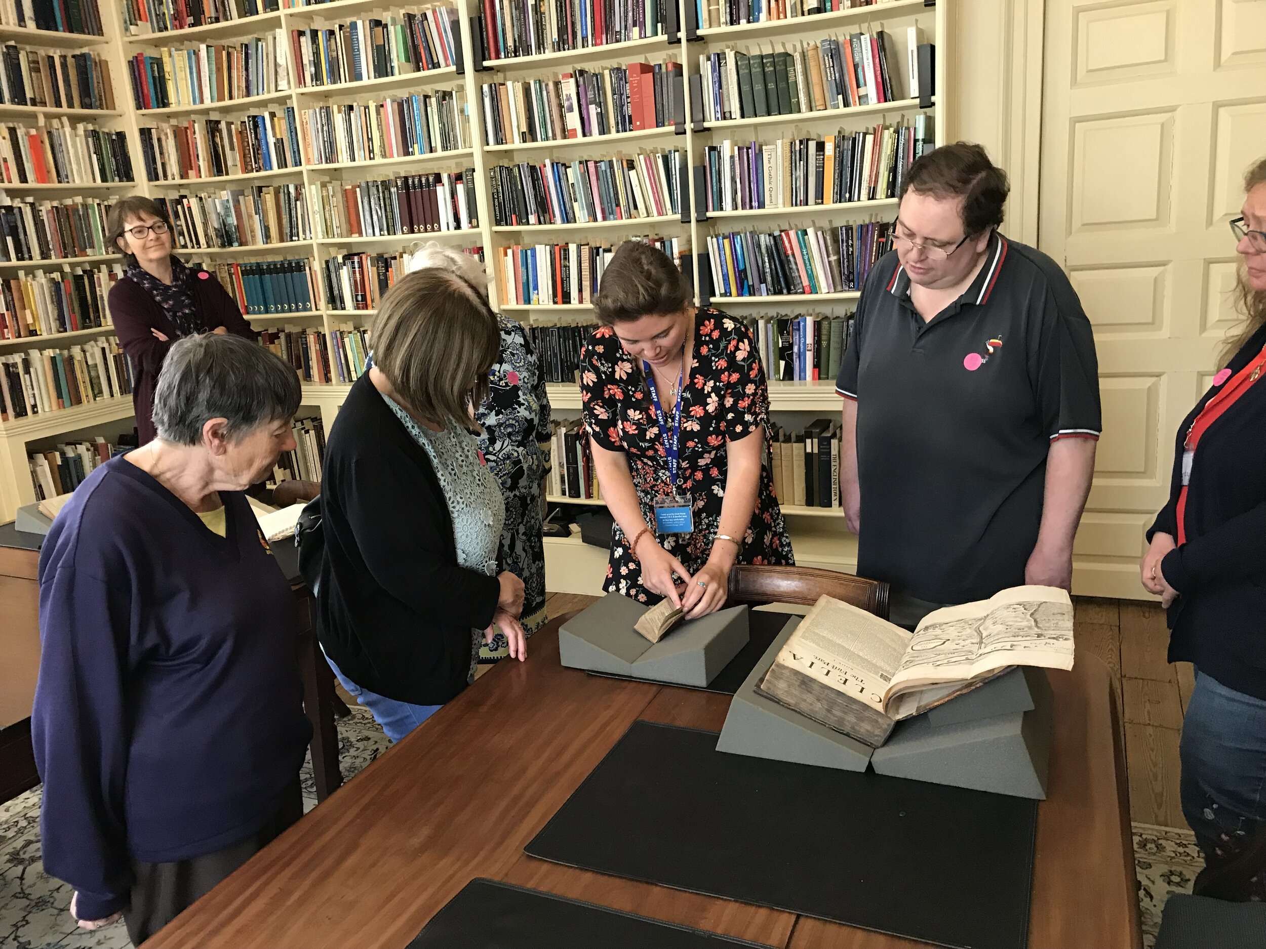 Looking at books in the library of Chawton House whilst on the writing course