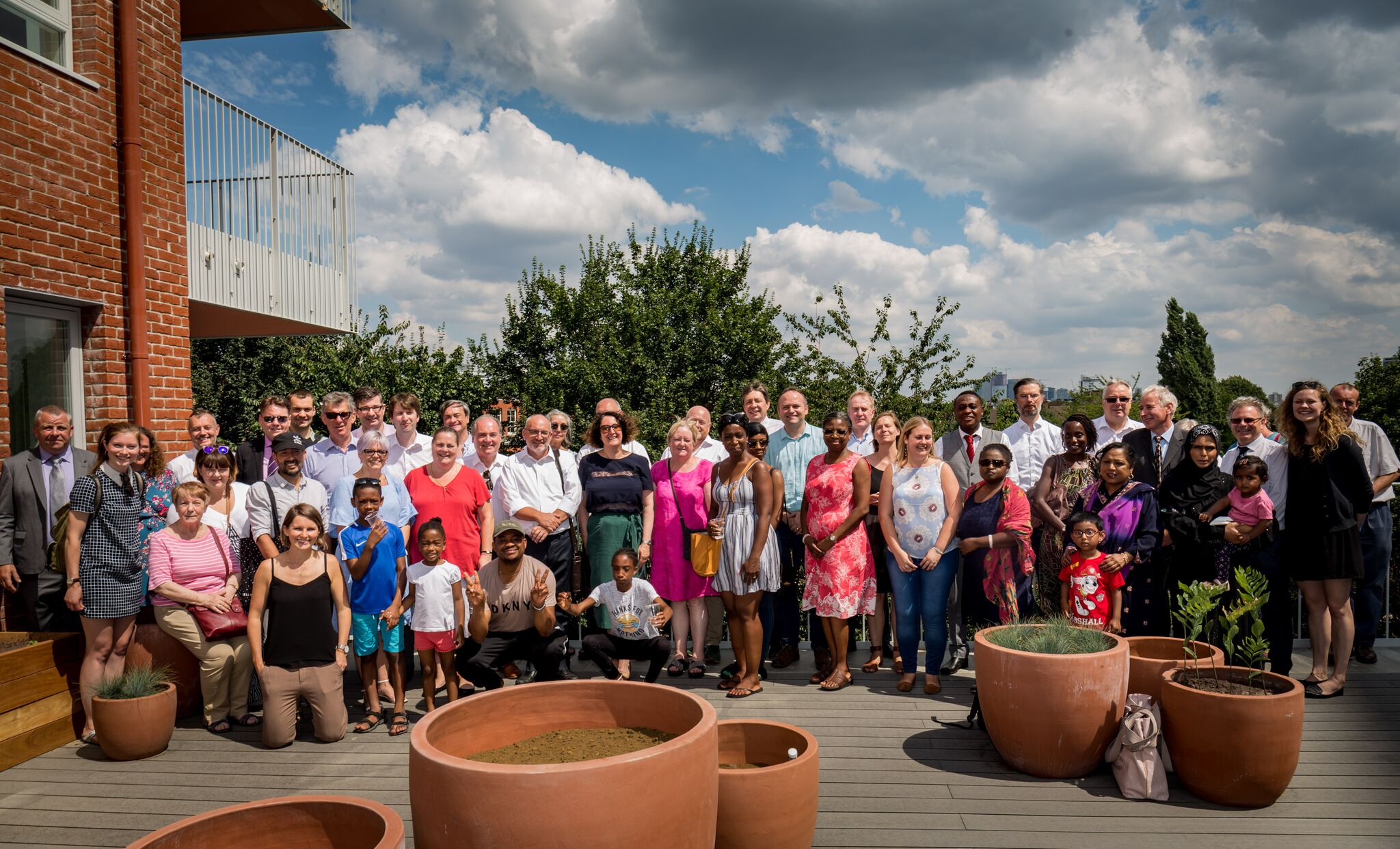 Residents and supporters celebrating completion.