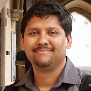 raj-headshot-180x180.png