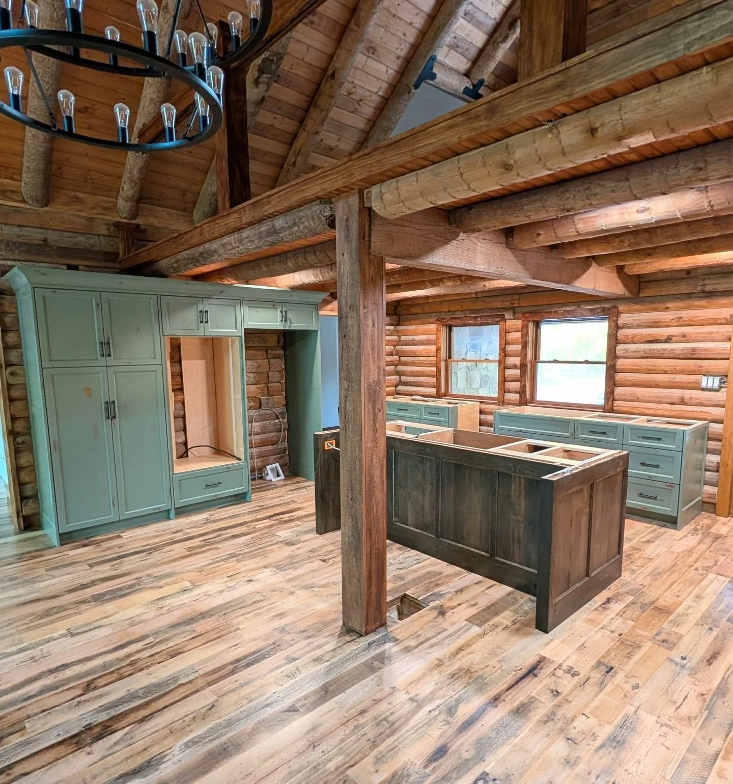 This kitchen cabinet project is all finished up and ready for finishing touches! We are grateful to be a part of this journey!
The family has been remodeling an old log cabin, and adding on a modern structure expansion. Our goal was to design and bu