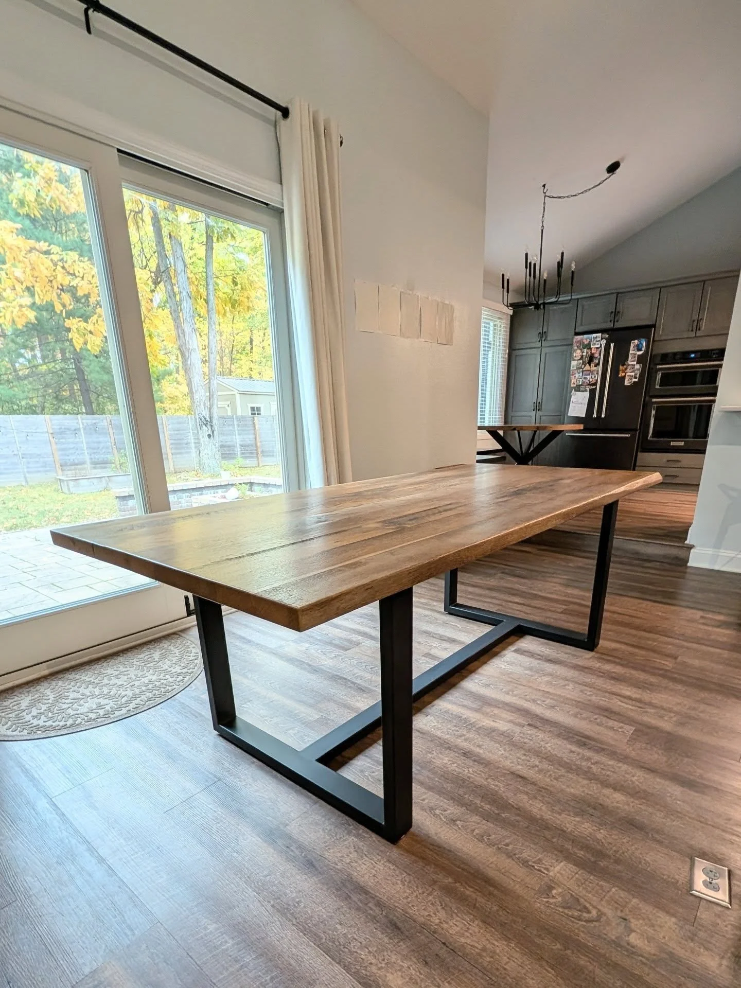We delivered this set of stunning reclaimed white oak tables to their new home in Zionsville. These clients are excited to fix up their new home, establish a family, and share many family meals around these tables. We worked to get them just the righ
