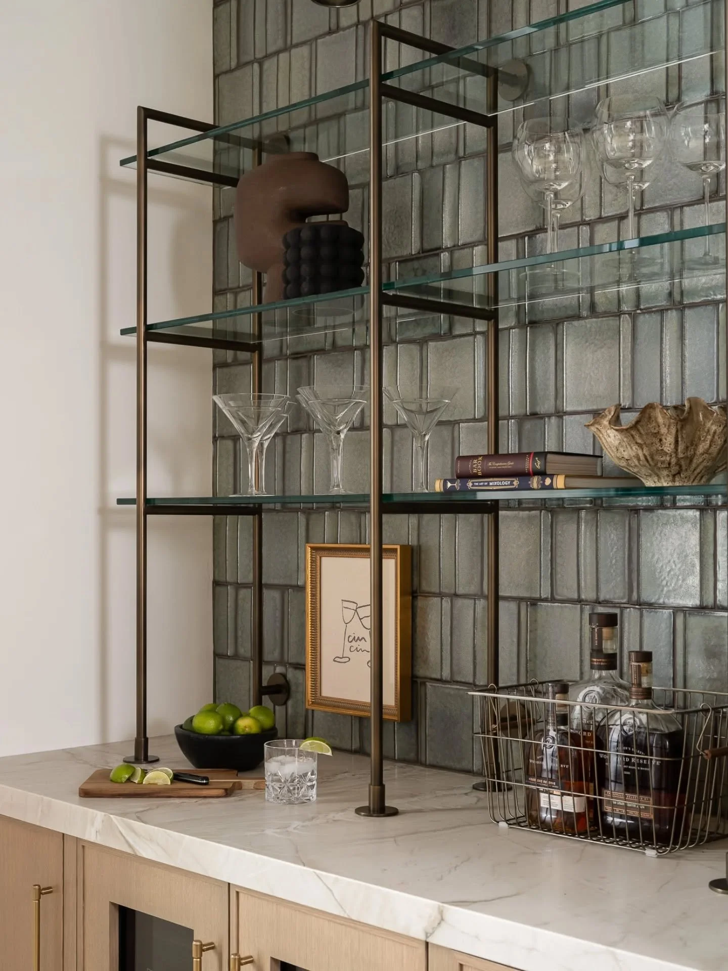 Here's a finished shot of another piece we built for a custom home up in Logansport, IN.  This is such a cute little kitchen bar!

Custom steel shelving with wall mounts and telescoping surface mounts. Powder coated in Dominion Bronze. Finished off w