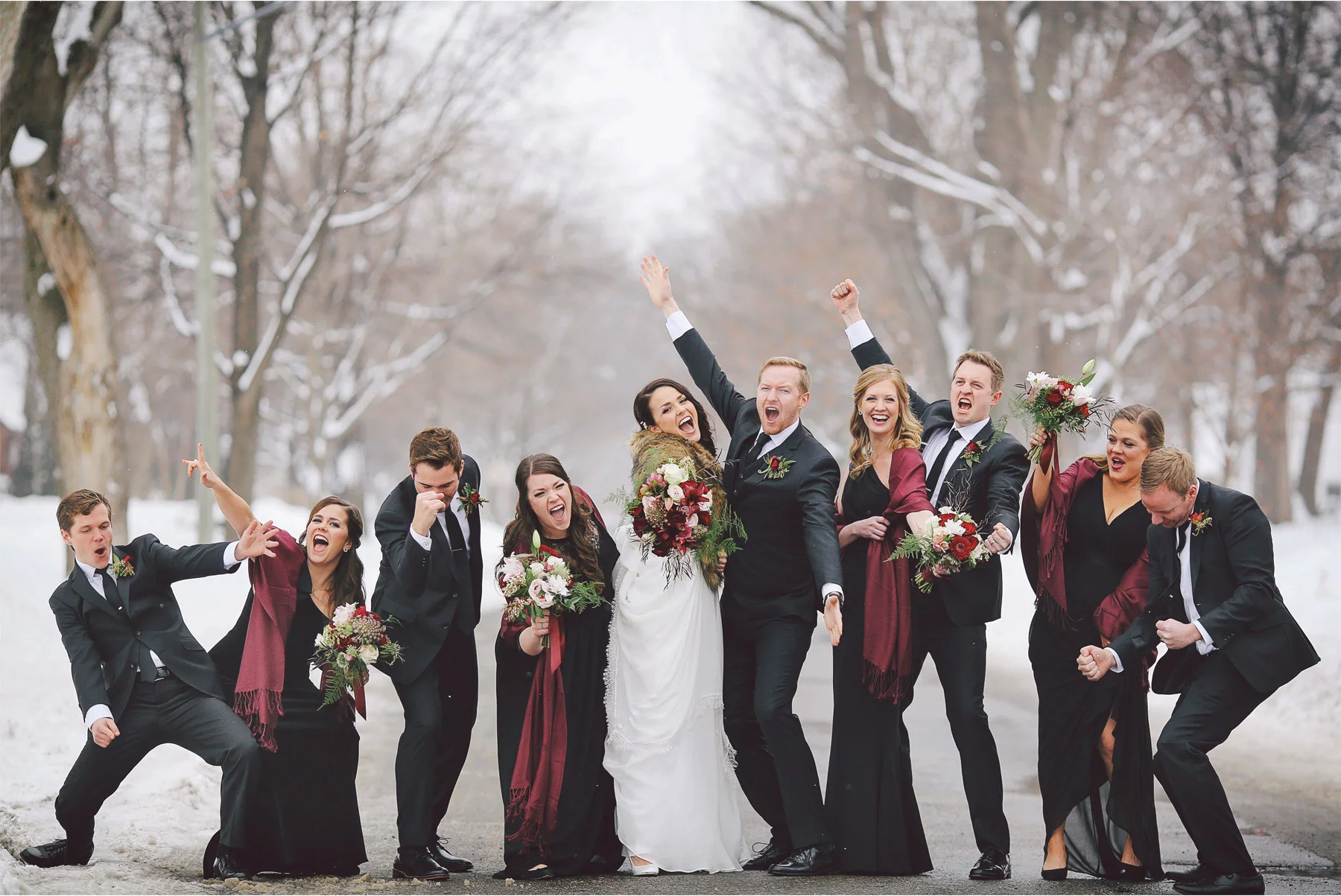 09-Minneapolis-Wedding-Photography-by-Vick-Photography-Snow-Winter-Wedding-Wedding-Party-Group-Dancing-Laura-and-Michael.jpg