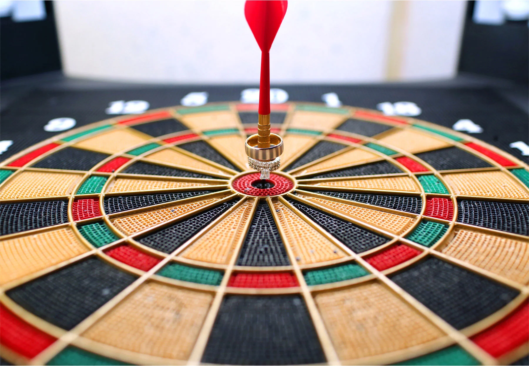 19-Saint-Paul-Minnesota-Wedding-Photographer-by-Andrew-Vick-Photography-Summer-Bride-Groom-JR-Macs-Bar-and-Grill-Rings-Dartboard-Lindsay-and-Dustin.jpg