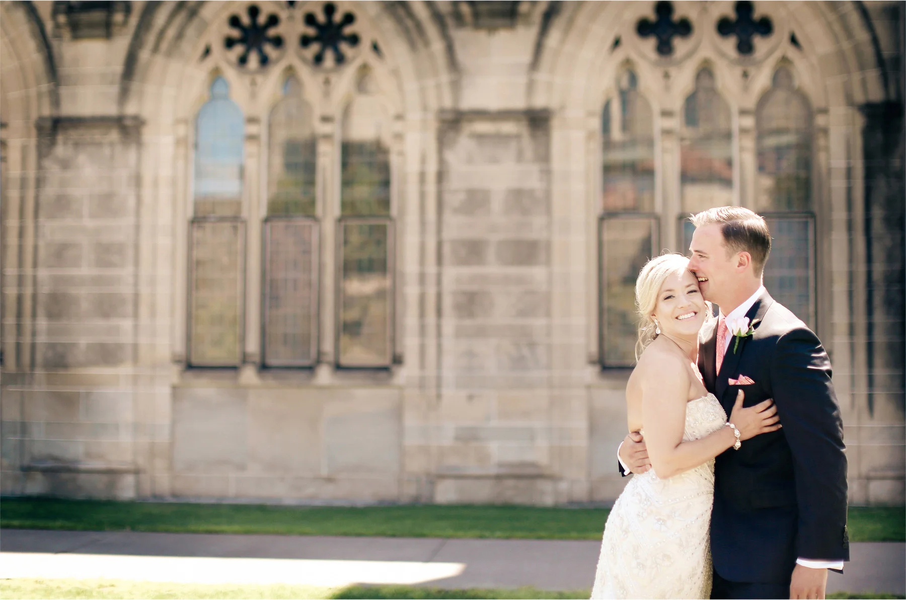 06-Duluth-Minnesota-Wedding-Photographer-by-Andrew-Vick-Photography-Summer-Cathedral-of-Our-Lady-of-the-Rosary-Church-First-Meeting-Bride-GroomCourtyard-Embrace-Vintage-Lindsey-and-Adam.jpg