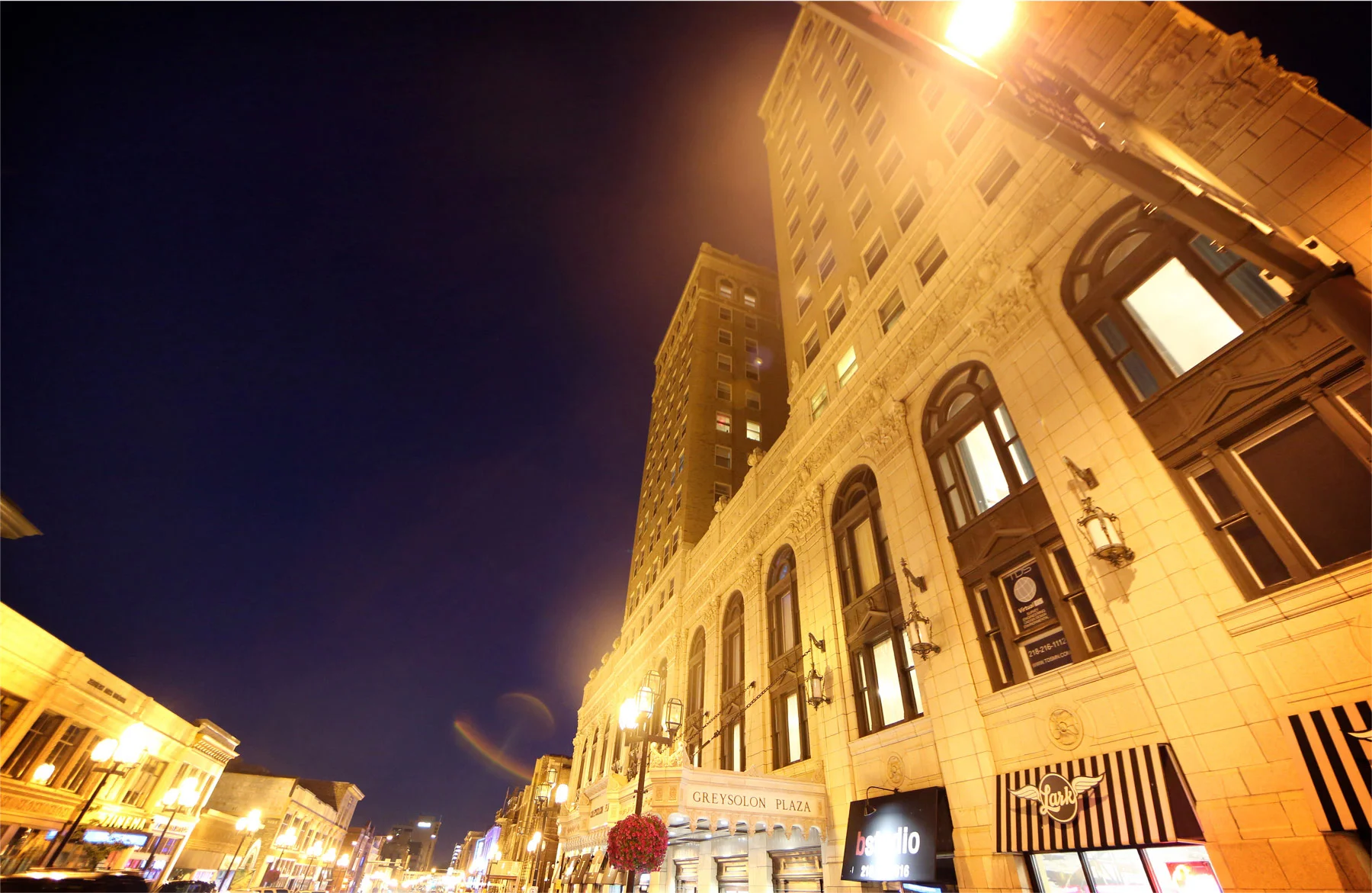 23-Duluth-Minnesota-Wedding-Photographer-by-Andrew-Vick-Photography-Summer-Greysolon-Ballroom-Outside-Street-View-Building-Night-Lindsey-and-Adam.jpg