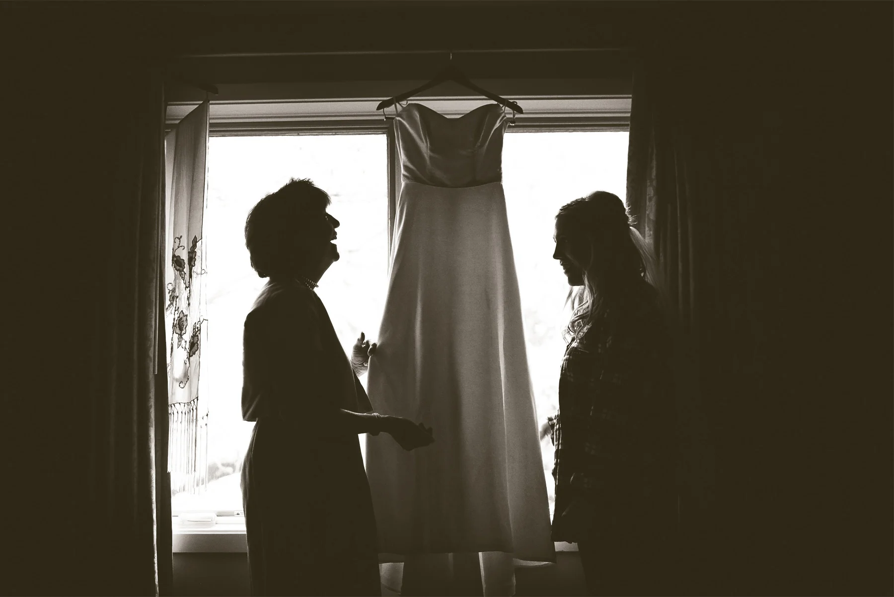 01-Minneapolis-Minnesota-Wedding-Photographer-by-Andrew-Vick-Photography-Fall-Autumn-Parents-House-Getting-Ready-Bride-Mother-Dress-Sepia-Krissy-and-James.jpg