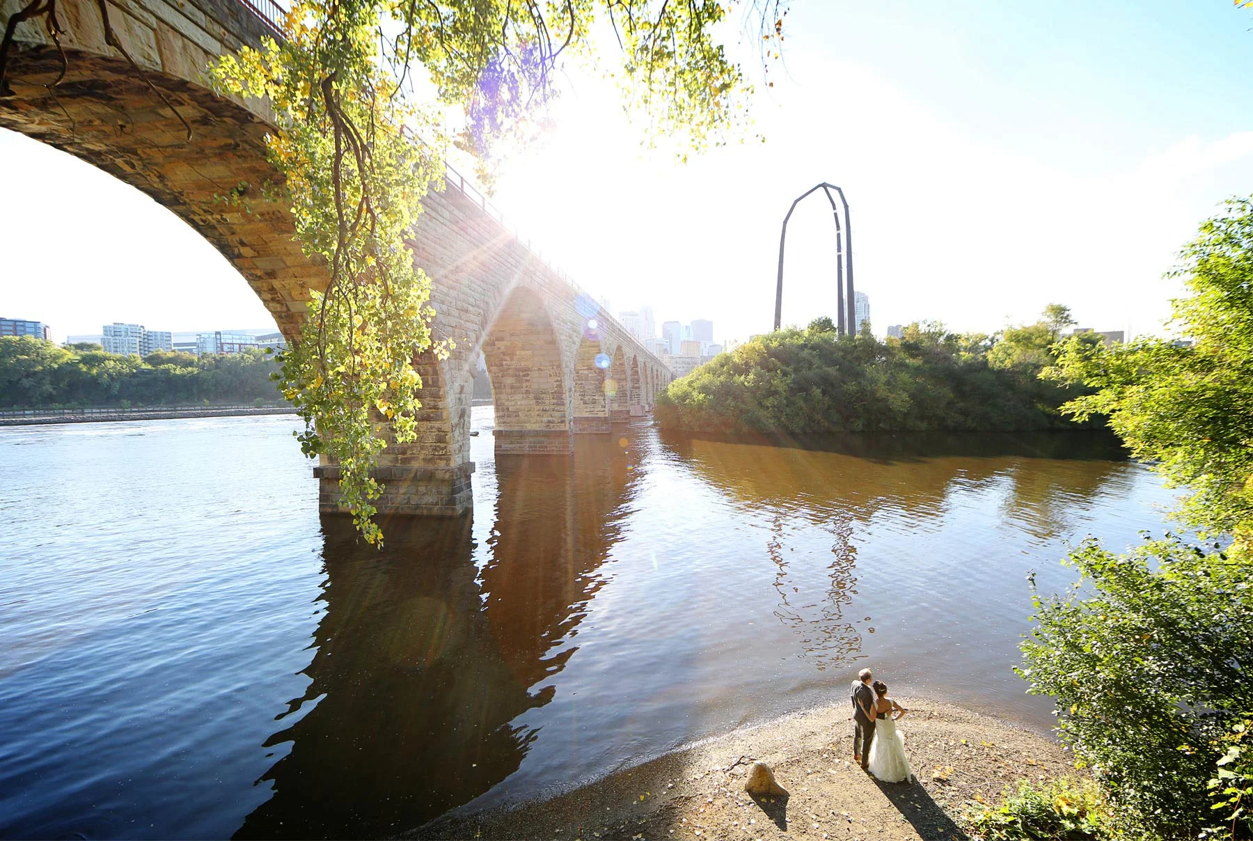 19-Minneapolis-Minnesota-Wedding-Photographer-by-Andrew-Vick-Photography-Fall-Autumn-Bride-Groom-Stone-Arch-Bridge-Mississippi-River-Paula-and-Jason.jpg