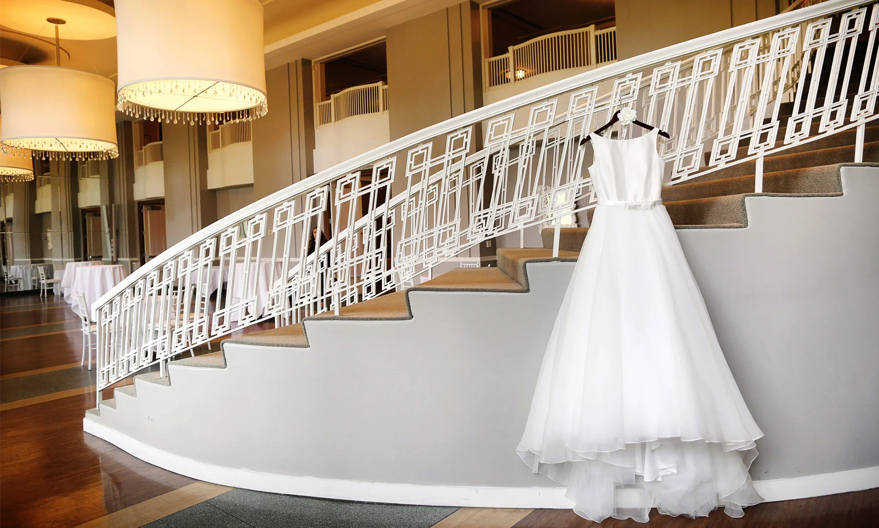 01-Minneapolis-Minnesota-Wedding-Photographer-by-Andrew-Vick-Photography-Fall-Autumn-Calhoun-Beach-Club-Getting-Ready-Dress-Staircase-Stairs-Kristy-and-Jack.jpg