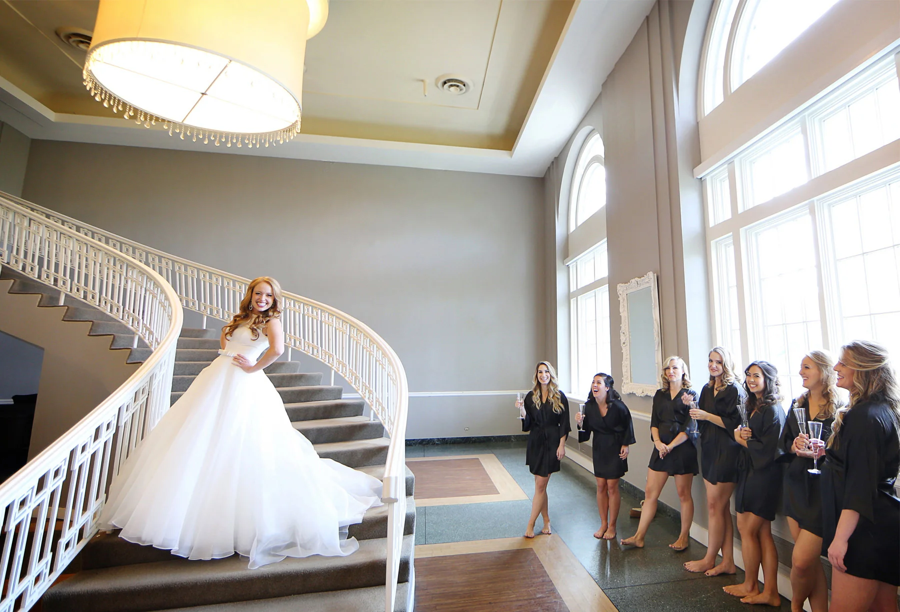 03-Minneapolis-Minnesota-Wedding-Photographer-by-Andrew-Vick-Photography-Fall-Autumn-Calhoun-Beach-Club-Getting-Ready-Bride-Bridesmaids-Dress-Staircase-Stairs-Champagne-Flutes-Kristy-and-Jack.jpg