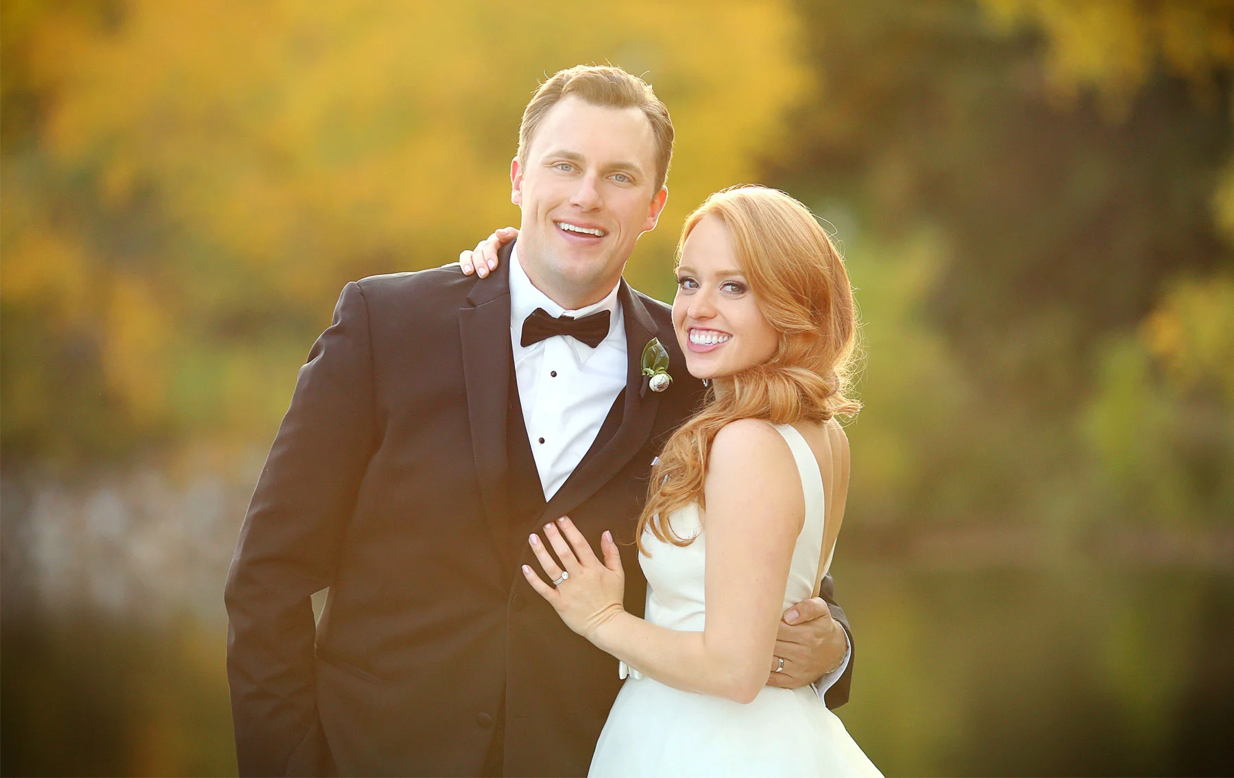 22-Minneapolis-Minnesota-Wedding-Photographer-by-Andrew-Vick-Photography-Fall-Autumn-Lake-Calhoun-Bride-Groom-Embrace-Kristy-and-Jack.jpg