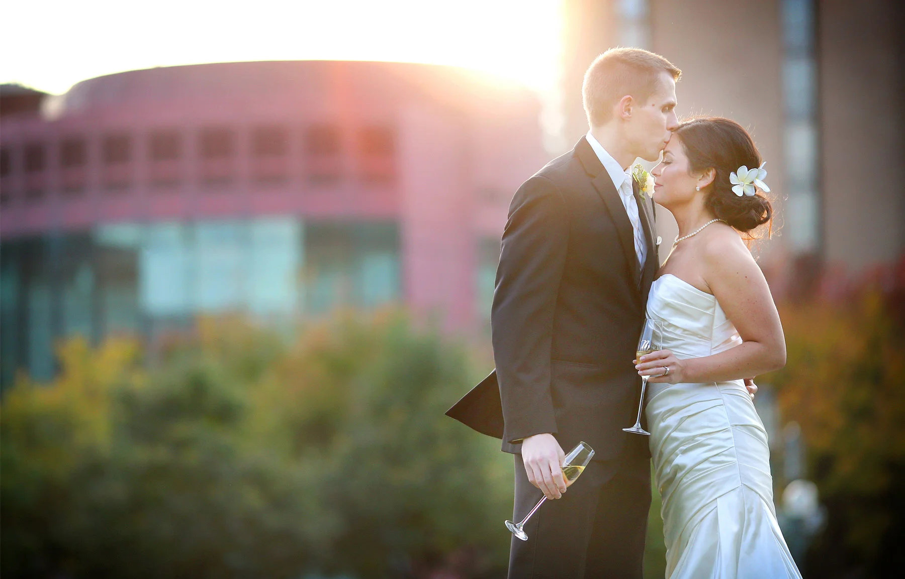 19-Minneapolis-Minnesota-Wedding-Photographer-by-Andrew-Vick-Photography-Fall-Autumn-Convention-Center-Bride-Groom-Champagne-Kiss-Amanda-and-Cary.jpg