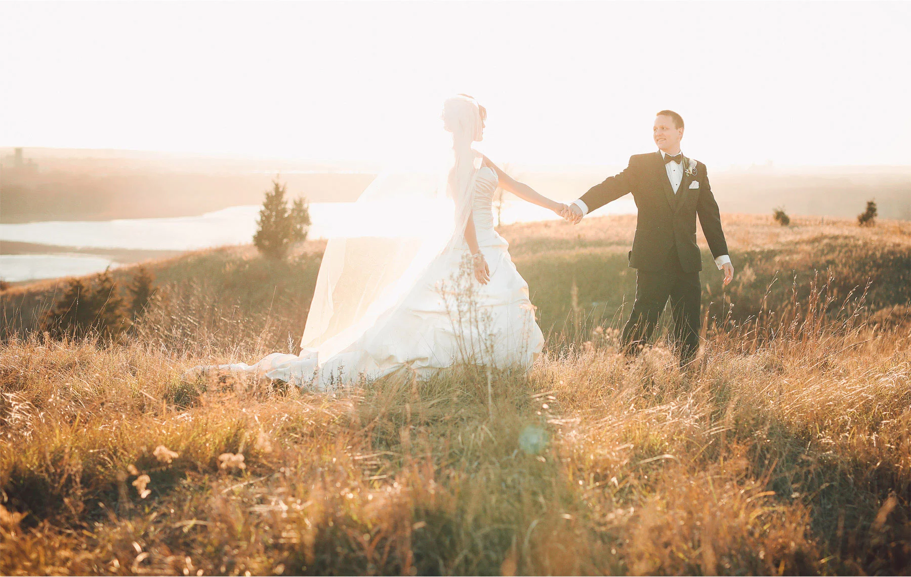 19-Eden-Prairie-Minnesota-Wedding-Photographer-by-Andrew-Vick-Photography-Fall-Autumn-Bearpath-Golf-Country-Club-Bride-Groom-Field-Holding-Hands-Vintage-Brittany-and-Ryan.jpg