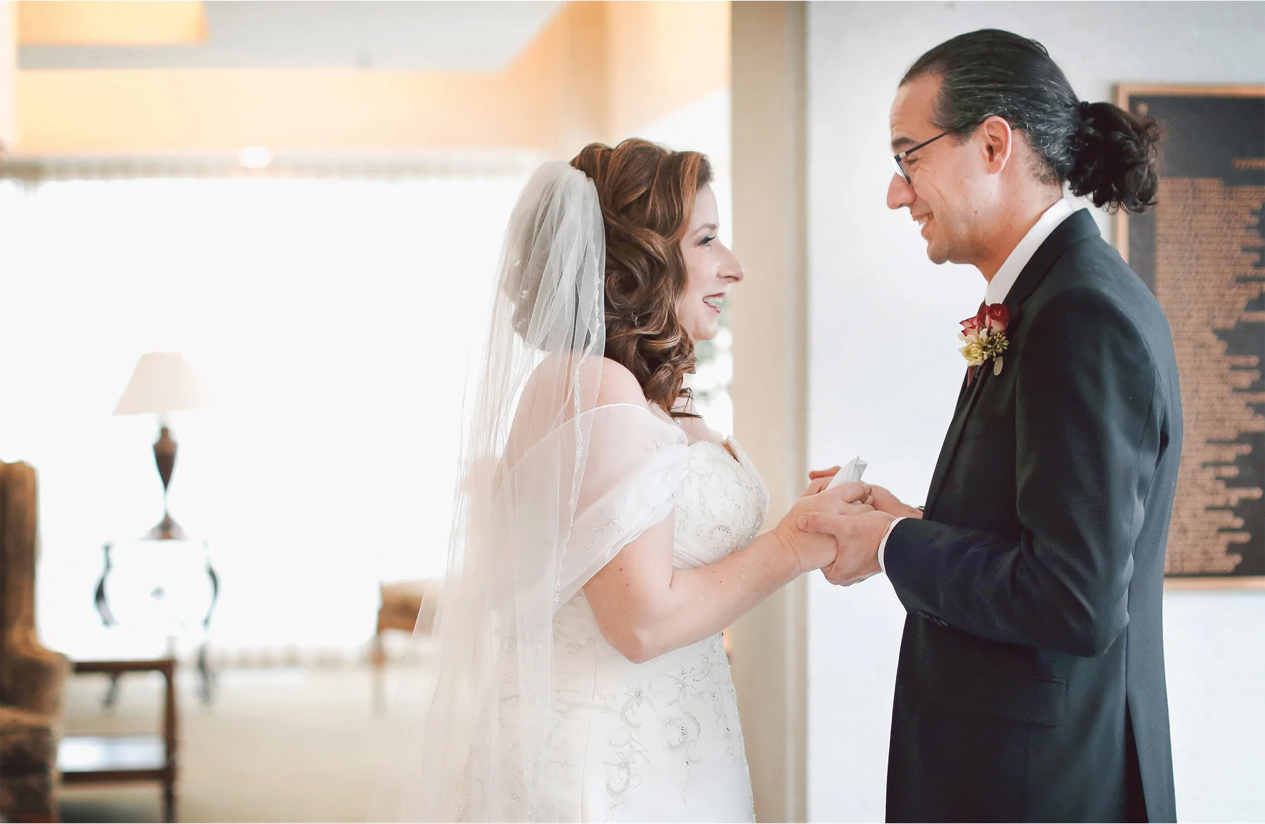04-Edina-Minnesota-Wedding-Photographer-by-Andrew-Vick-Photography-Winter-Saint-Patricks-Catholic-Church-First-Meeting-Look-Bride-Groom-Tears-Handkerchief-Vintage-Elizabeth-and-Brian.jpg