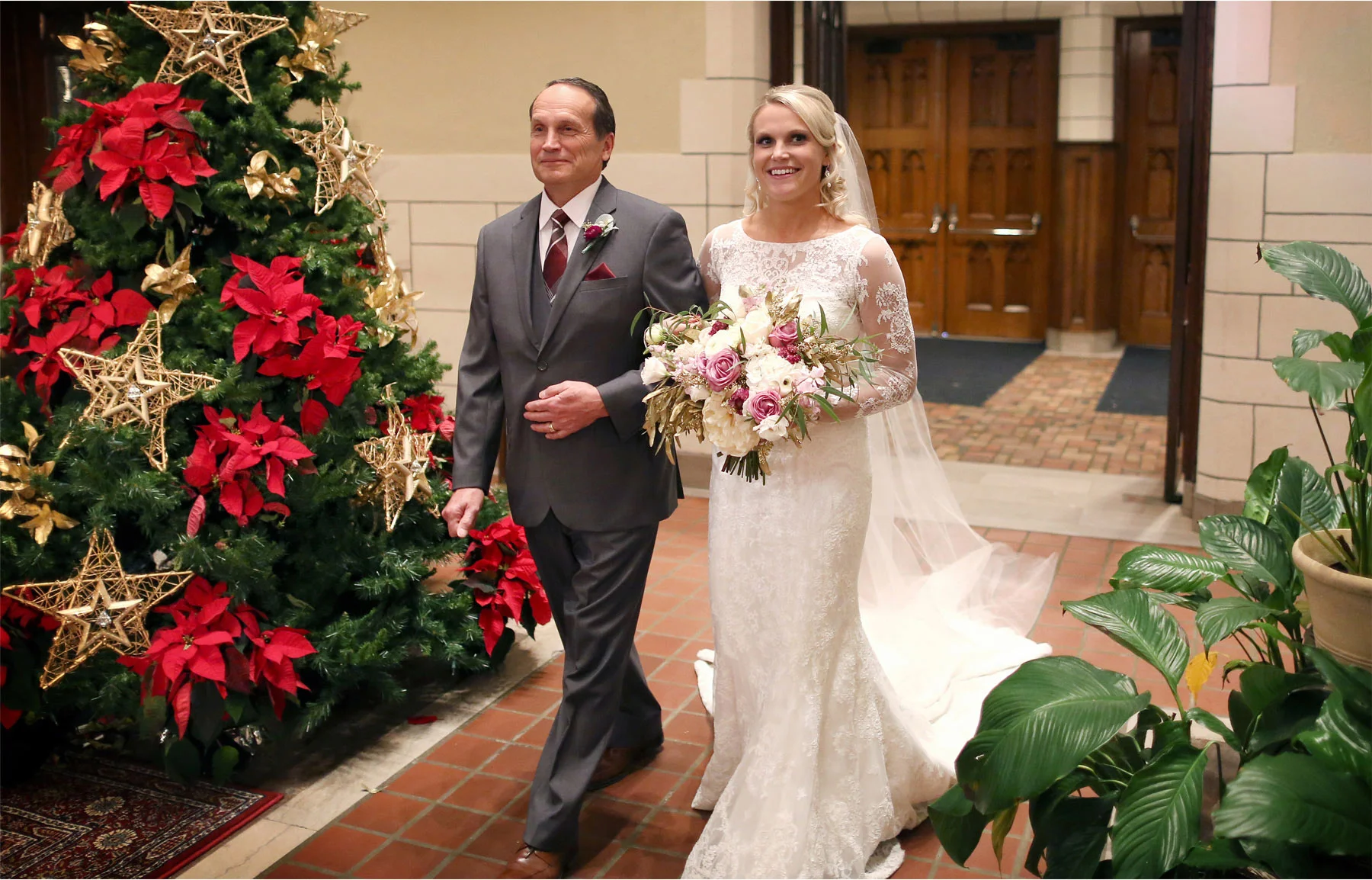12-Minneapolis-Minnesota-Wedding-Photographer-by-Andrew-Vick-Photography-Winter-Central-Lutheran-Church-Ceremony-Bride-Father-Parents-Flowers-Processional-Brittany-and-Joseph.jpg