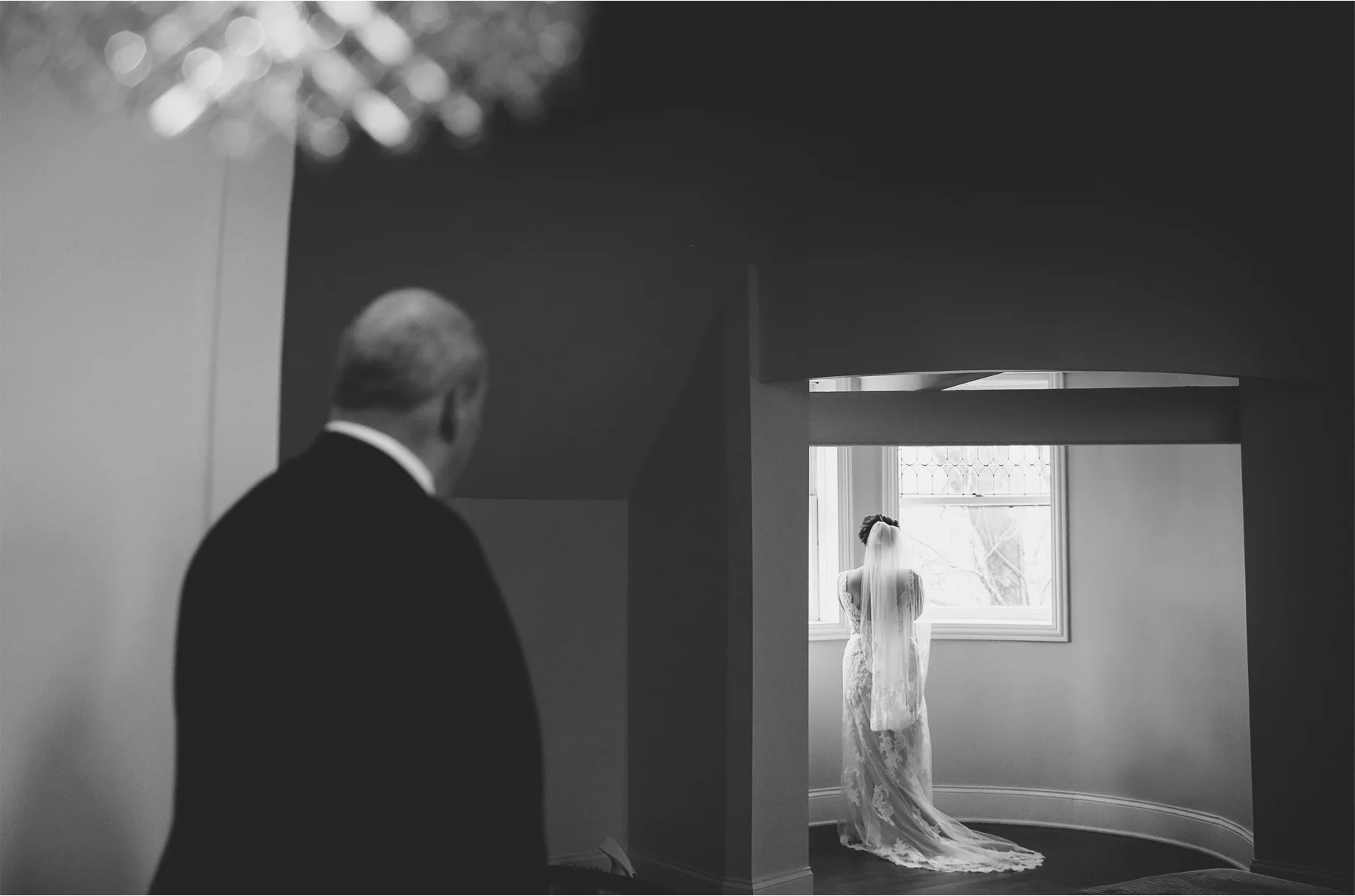 03-Chicago-Illinois-Wedding-Photographer-by-Andrew-Vick-Photography-Winter-Stan-Mansion-Getting-Ready-Bride-Father-Parents-Reveal-Black-and-White-Colleen-and-Mike.jpg