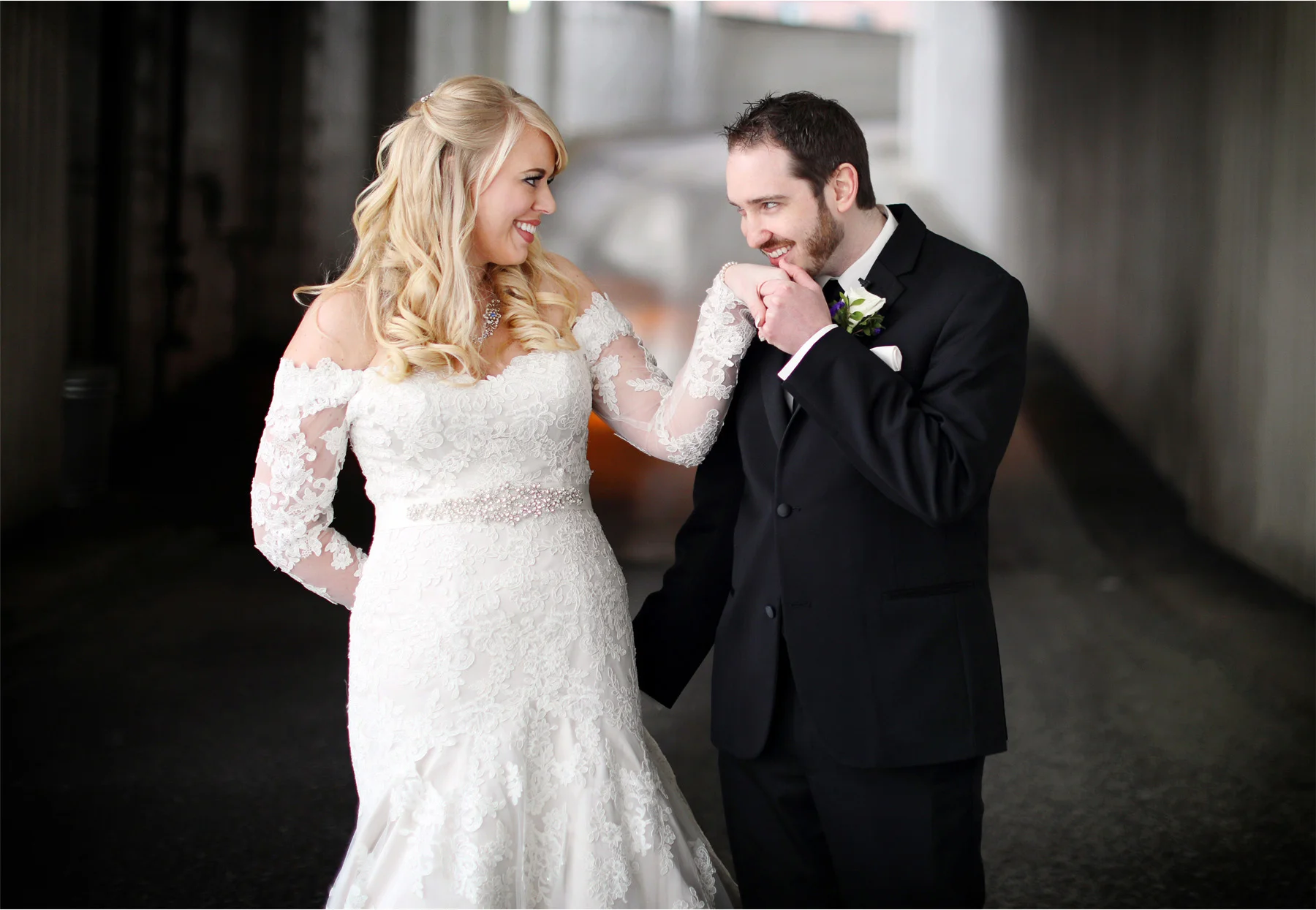 05-Minneapolis-Minnesota-Wedding-Photographer-by-Andrew-Vick-Photography-Winter-Millennium-Hotel-First-Meeting-Look-Bride-Groom-Kiss-Jennifer-and-Phillip.jpg