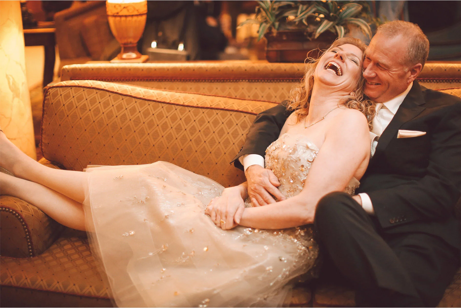 05-Saint-Paul-Minnesota-Wedding-Photographer-by-Andrew-Vick-Photography-Winter-Landmark-Center-First-Meeting-Look-Bride-Groom-Embrace-Laughter-Vintage-Dannette-and-Darren.jpg