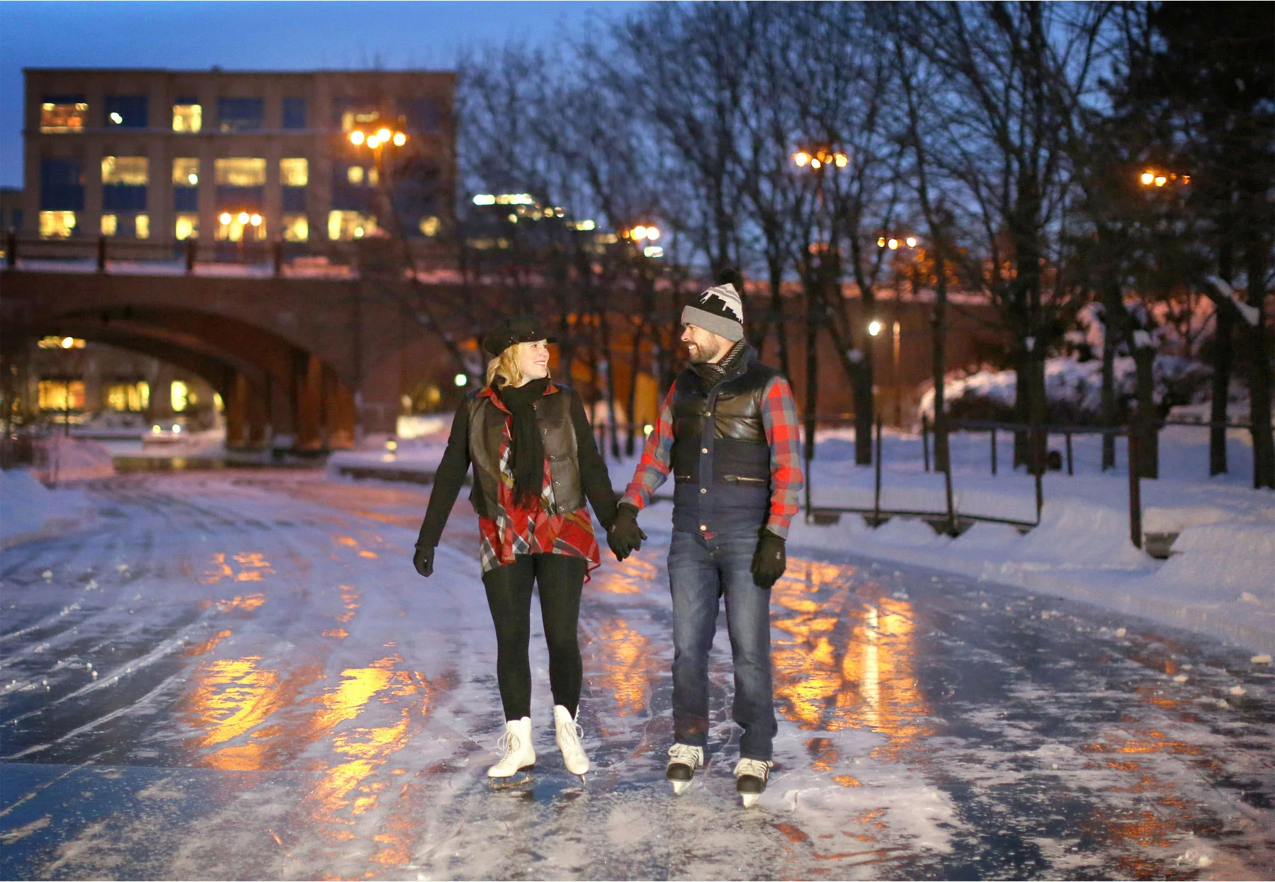 08-Edina-Minnesota-Wedding-Photographer-by-Andrew-Vick-Photography-Winter-Engagement-Bride-Groom-Snow-Bridge-Night-Lights-Ice-Skating-Frozen-Pond-Heather-and-Rob.jpg