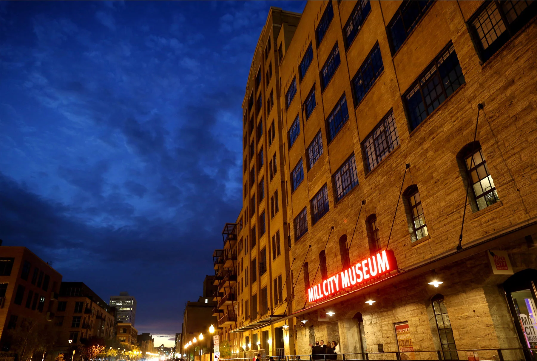 19-Minneapolis-Minnesota-Wedding-Photographer-by-Andrew-Vick-Photography-Spring-Mill-City-Museum-Downtown-Sign-Night-Dannette-and-Darren.jpg