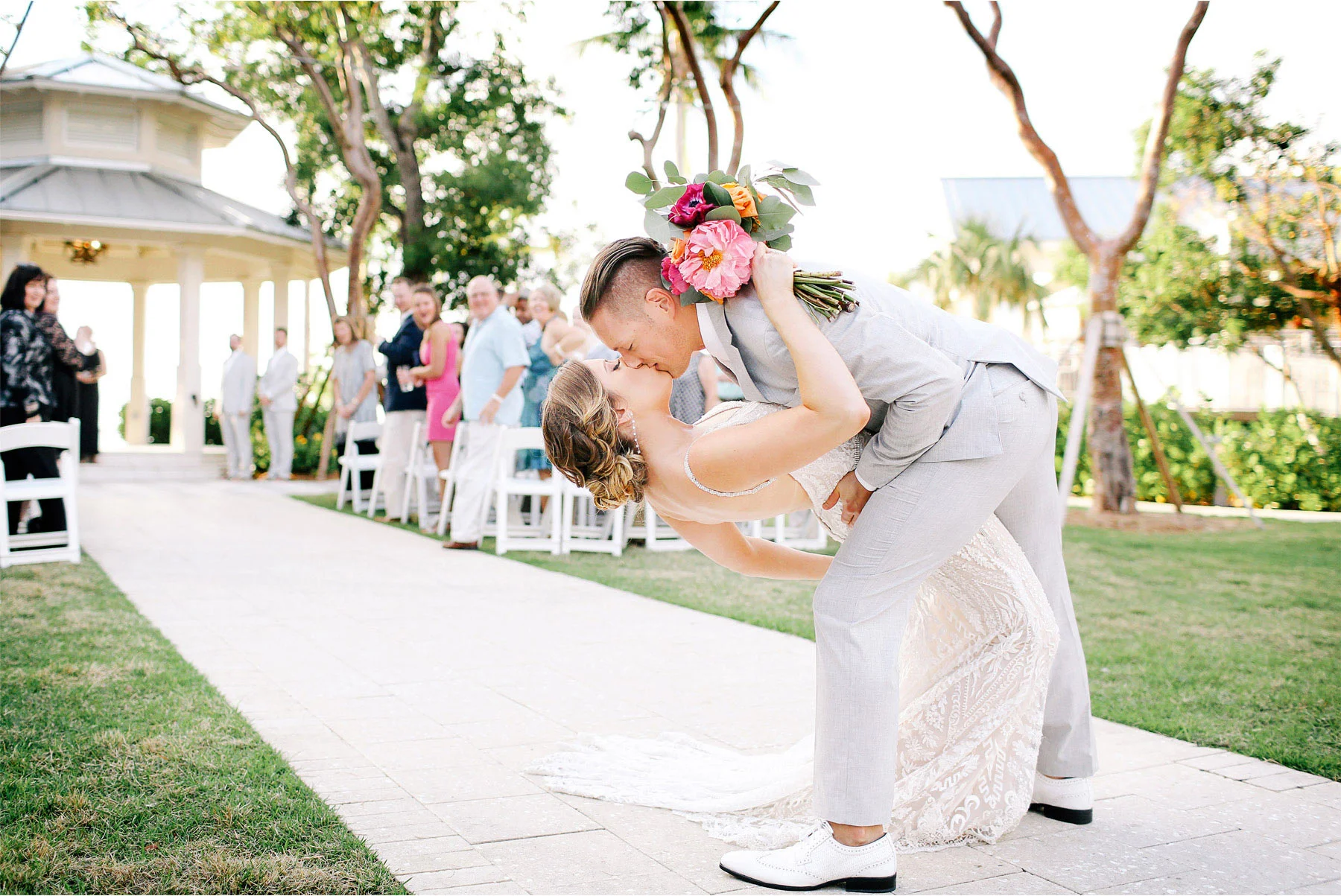 15-Key-Largo-Florida-Keys-Wedding-Photographer-by-Andrew-Vick-Photography-Playa-Largo-Resort-and-Spa-Hotel-Destination-Winter-Ceremony-Bride-Groom-Recessional-Dip-Kiss-Carrie-and-Brian.jpg