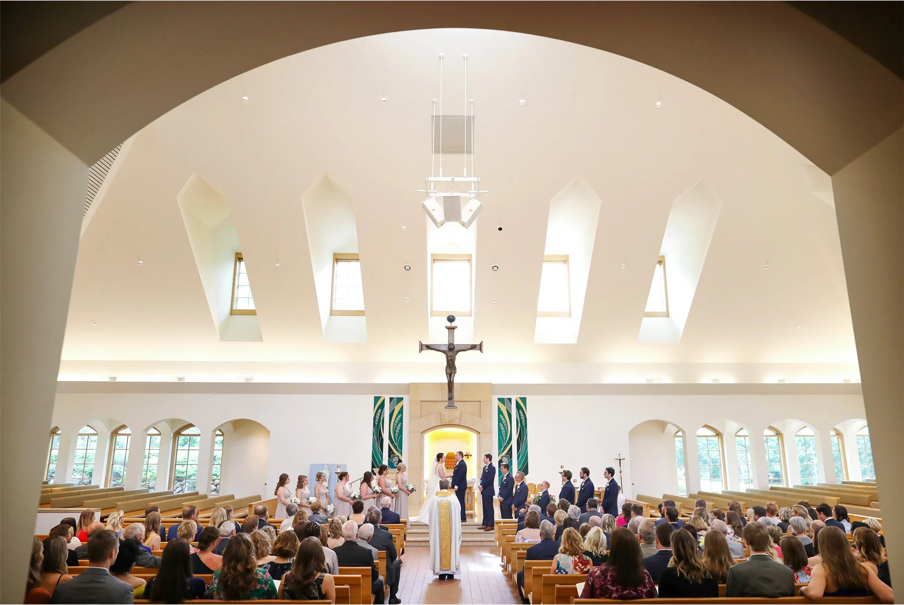 13-Vick-Photography-Wedding-Minneapolis-Minnesota-Our-Lady-of-Grace-Catholic-Church-Ceremony-Hug-Erin-and-David.jpg