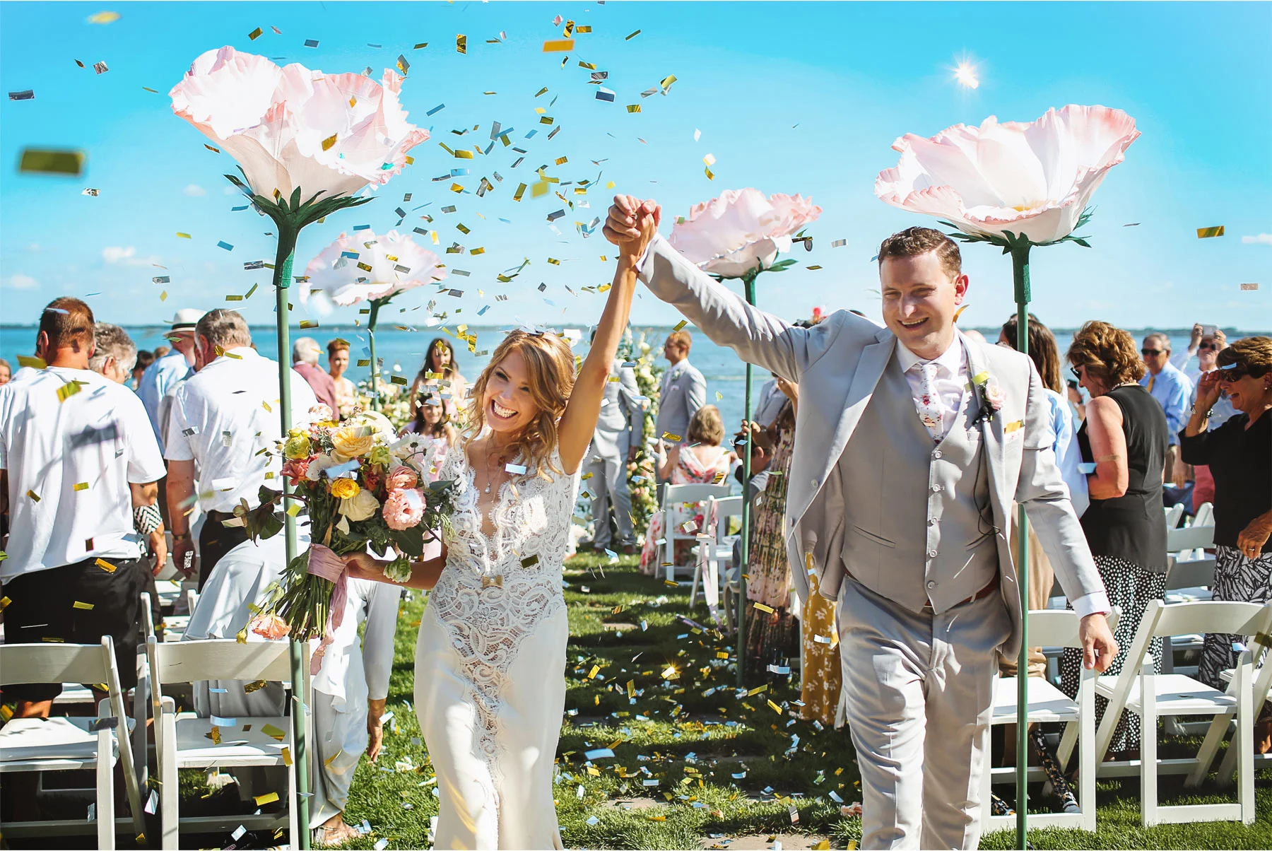 16-Vick-Photography-Wedding-Ottertail-Minnesota-Alice-in-Wonderland-Theme-Ceremony-Outdoor-Lake-Bride-Groom-Giant-Poppys-Flowers-Confetti-Tess-and-Greg.jpg