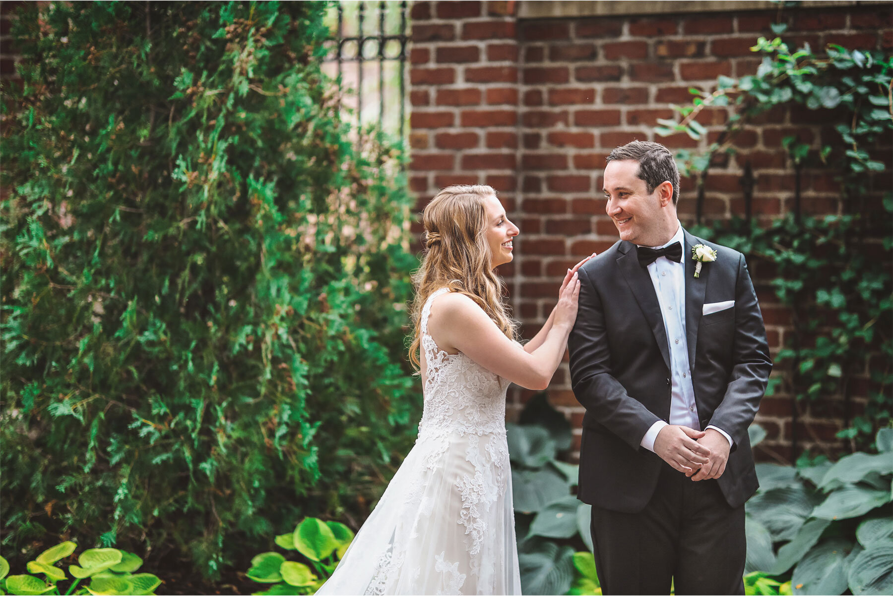 03-Minnesota-Wedding-Vick-Photography-Minneapolis-Event-Centers-Bride-Groom-First-Look-Courtyard-Amy-and-Avi.jpg