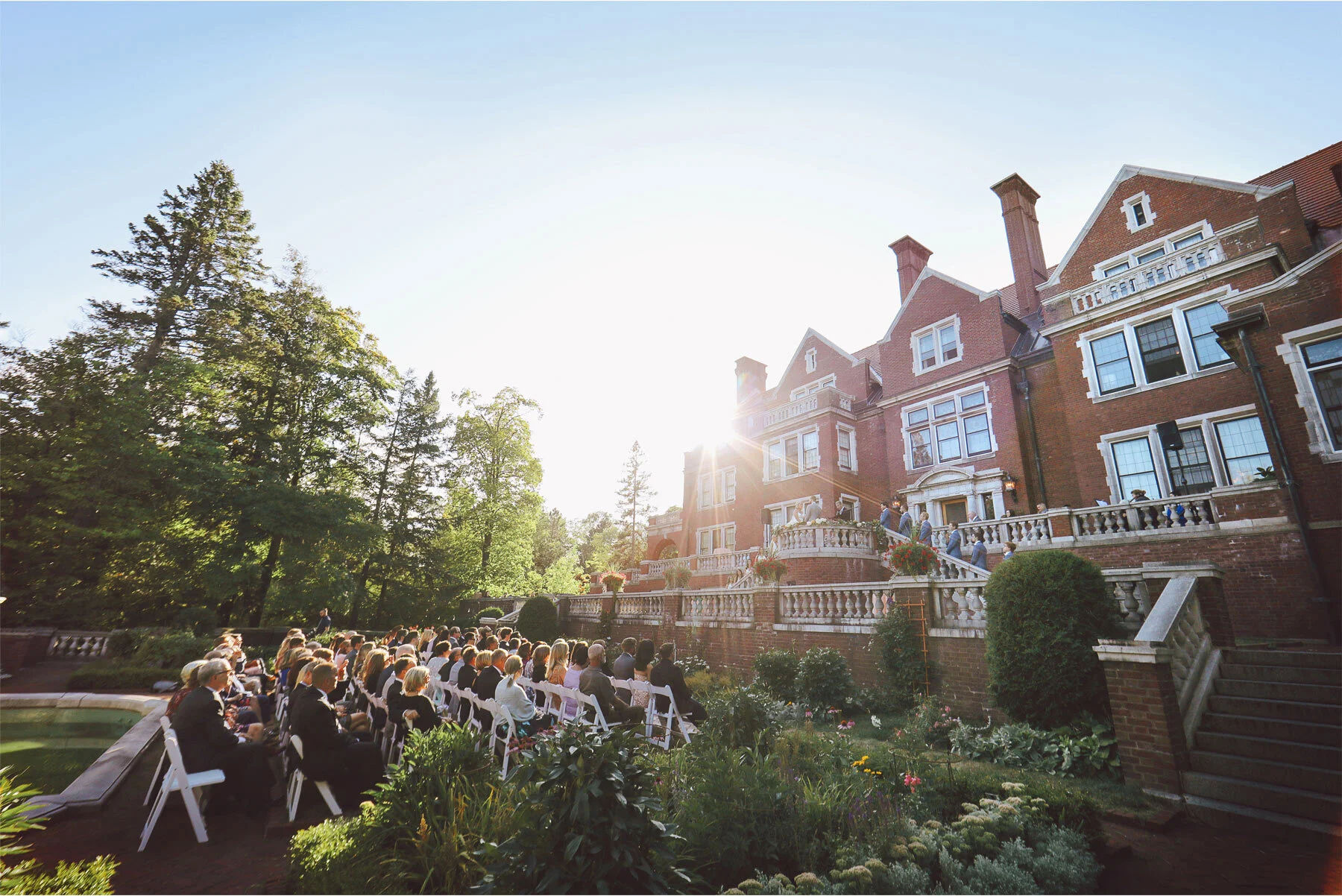 15-Vick-Photography-Wedding-Duluth-Minnesota-Glensheen-Mansion-Ceremony-Outdoor-Sunflare-Catherine-and-John.jpg