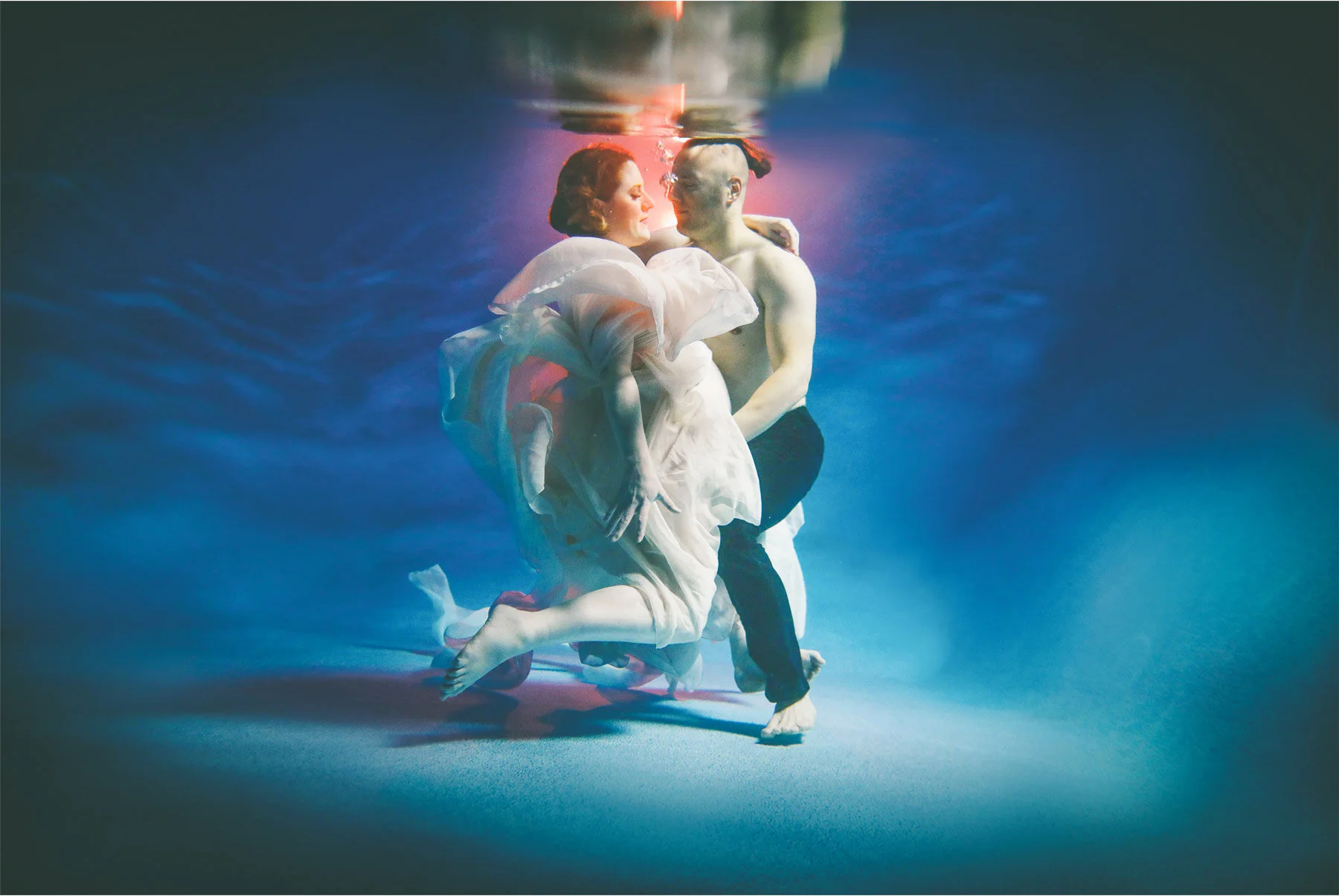 03-Vick-Studios-Maternity-Baby-Bump-Photo-Session-Mother-Father-Pool-Underwater-Dress-Night-Carrie-and-Brian.jpg