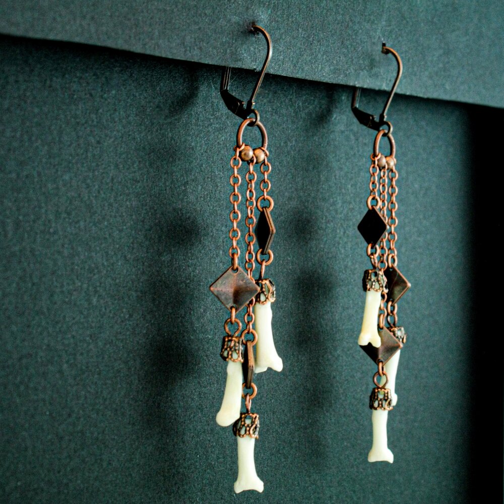 Real taxidermy raccoon toe animal bone earrings with pyramid charm in  antique copper. — Feral Grandmother Artistry