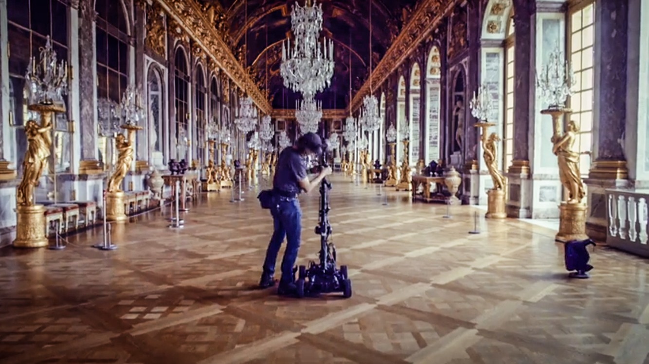 Sébastien, getting ready to drive a Nokia Ozo on a Mantis 360 remote control car, inside the Hall of Mirrors, in the Castle of Versailles, in France.