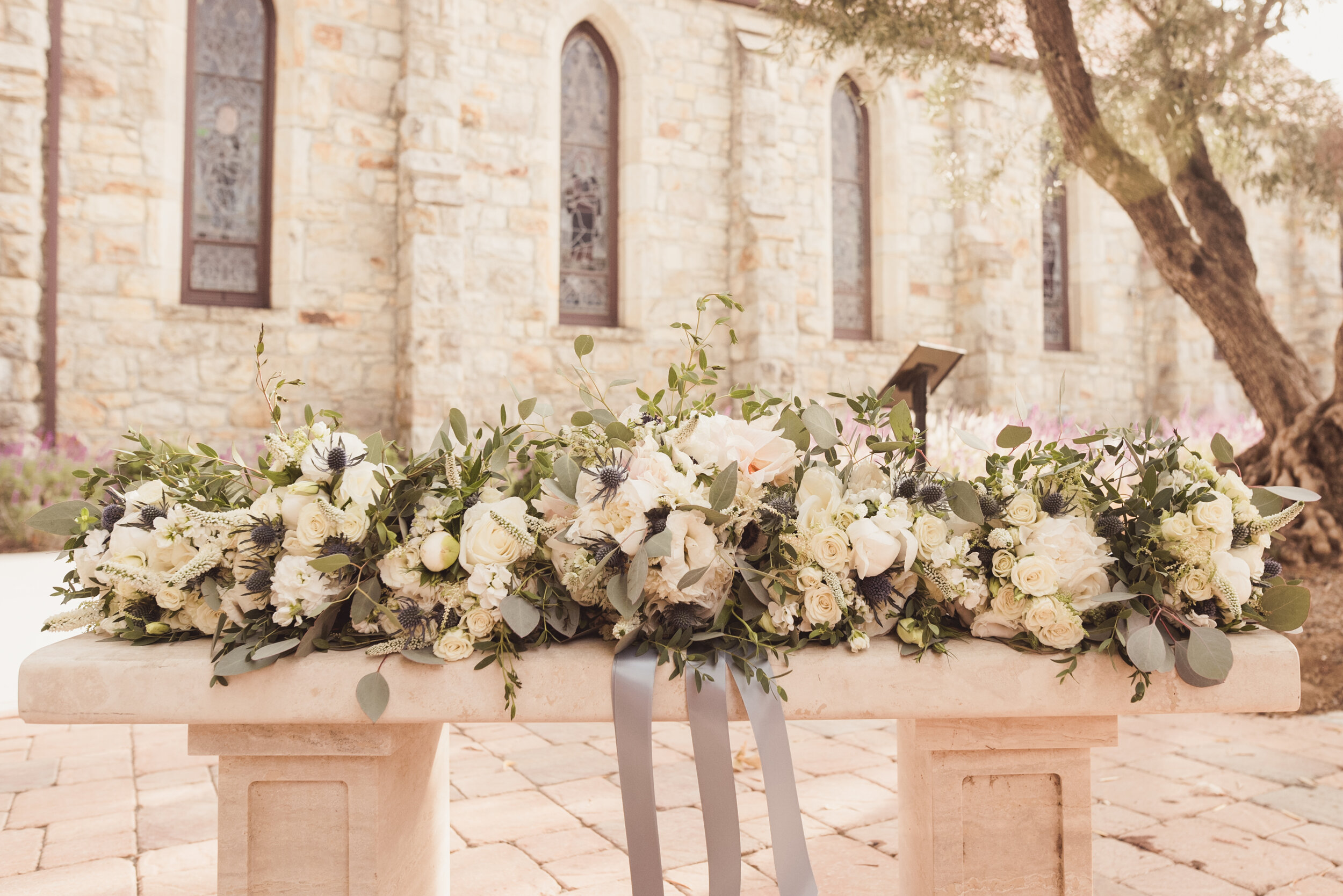 bouquets on bench.jpg