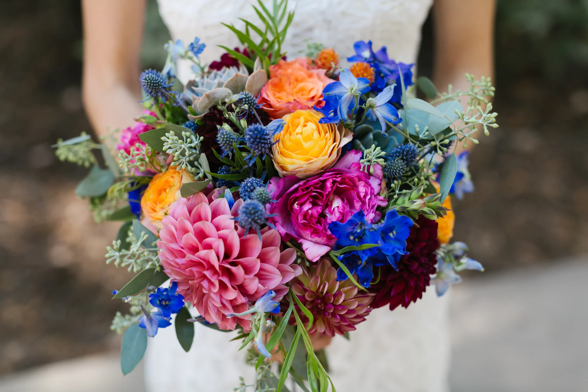 Colorful wedding bouquet with pink dahlias