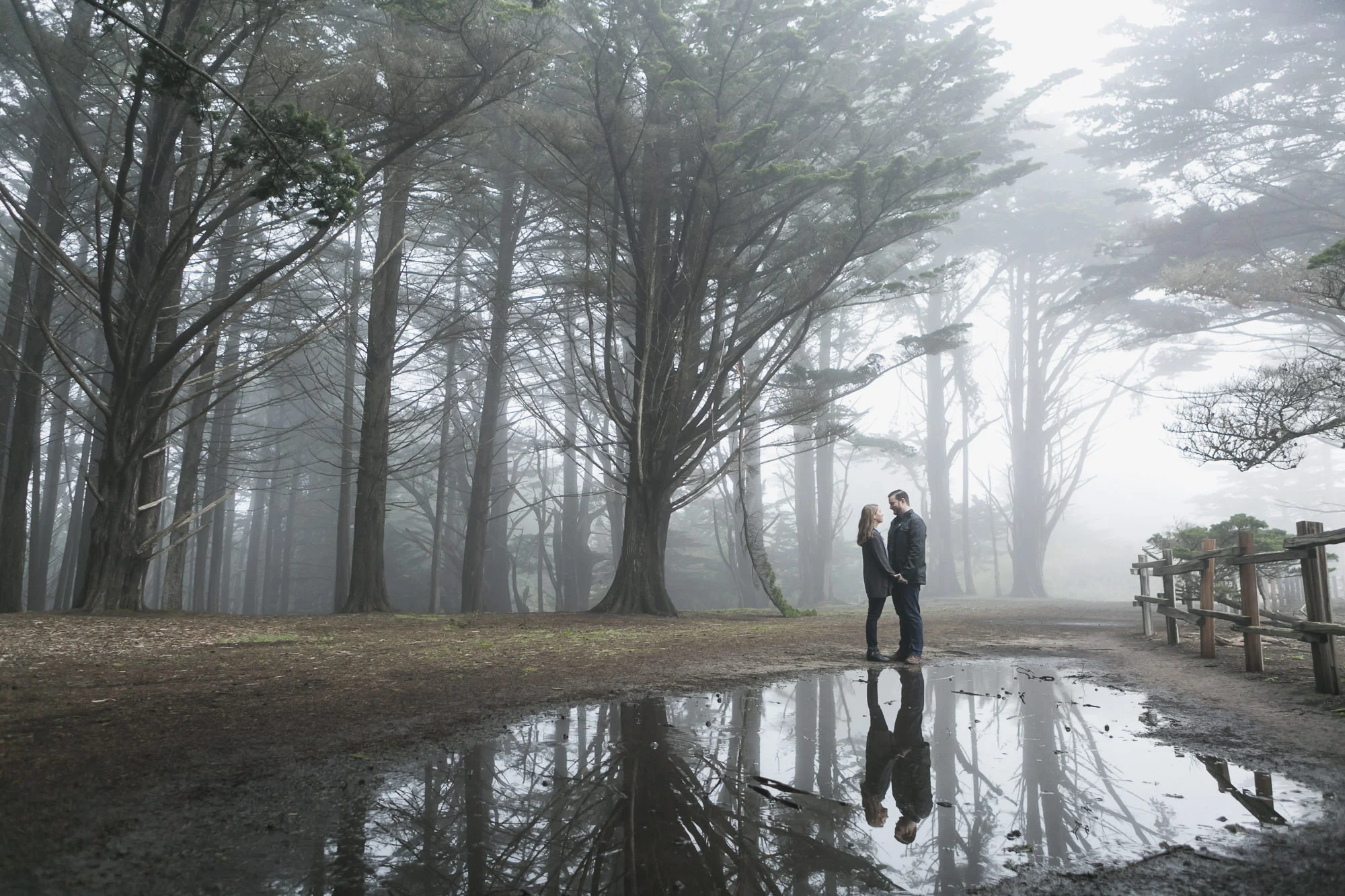 Foggy engagement session at the Fitzgerald Marine Reserve near Half Moon Bay with reflection