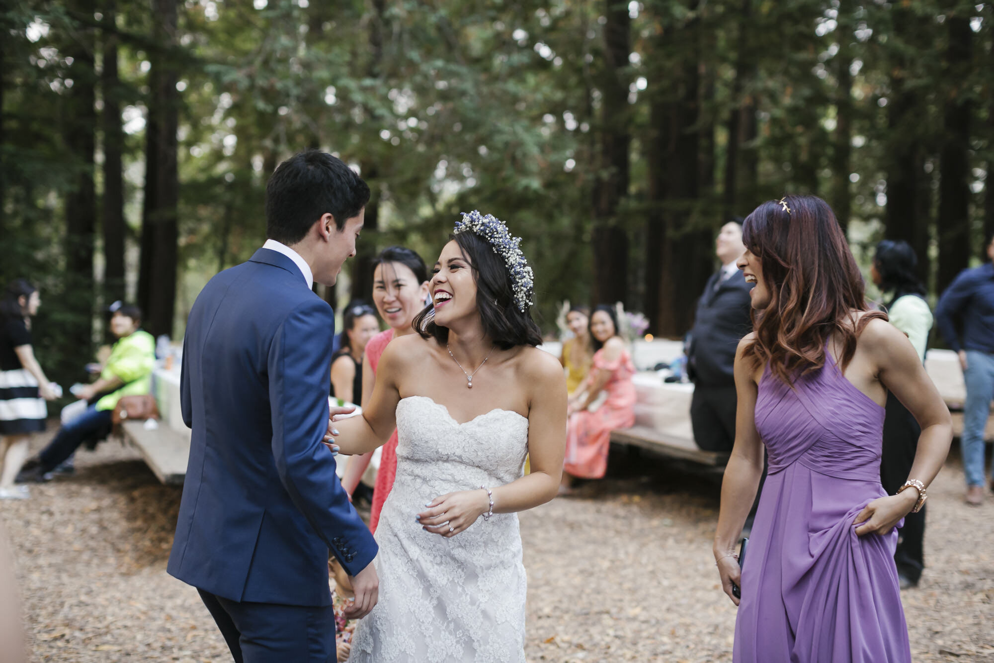 Bride and groom dance together at their picnic wedding reception
