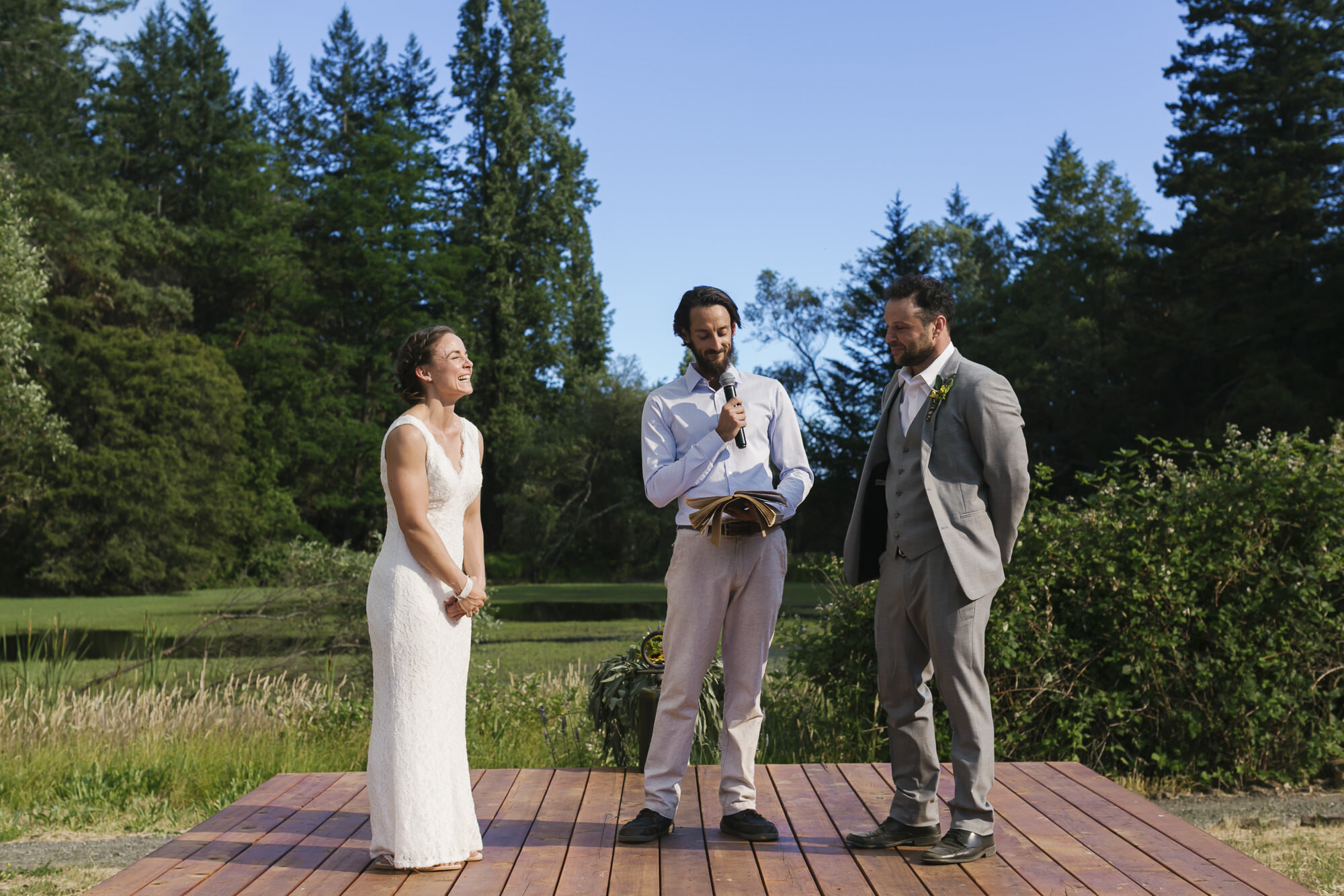 Crossfit couple get married on their Sonoma property in front of a pond