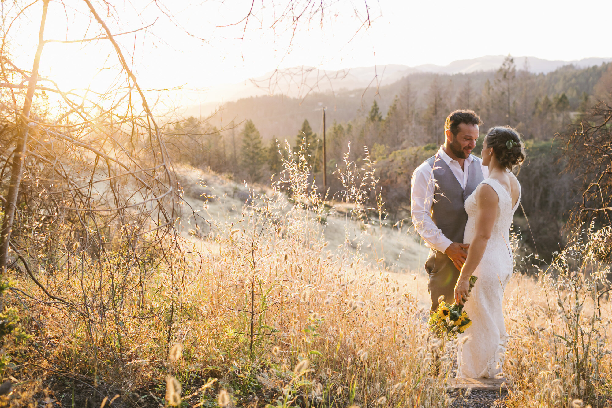 Sunset wedding portraits among wildfire burn damage in Sonoma California