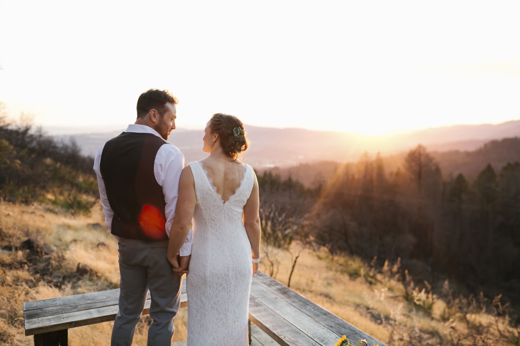 Sunset wedding portraits among wildfire burn damage in Glen Ellen California