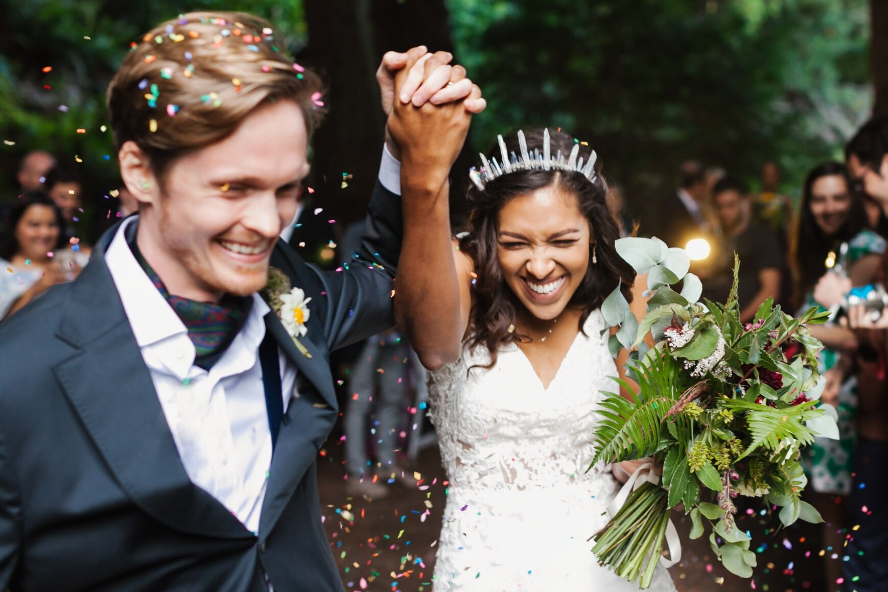 California farm wedding couple exit their ceremony with colorful confetti flying