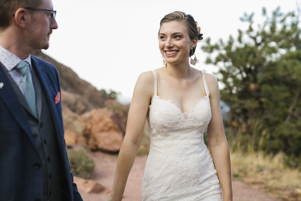 Bride smiles at her groom on their adventure elopement in Colorado