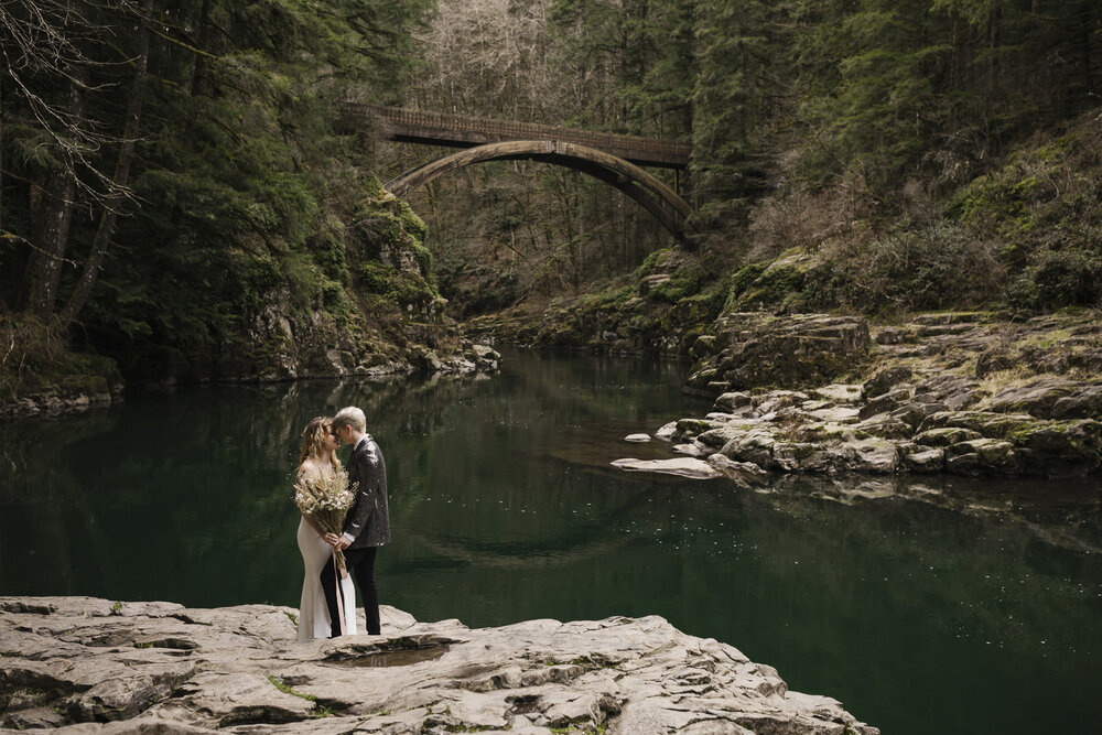 Same sex elopement couple celebrate their wedding day at Moulton Falls in Washington