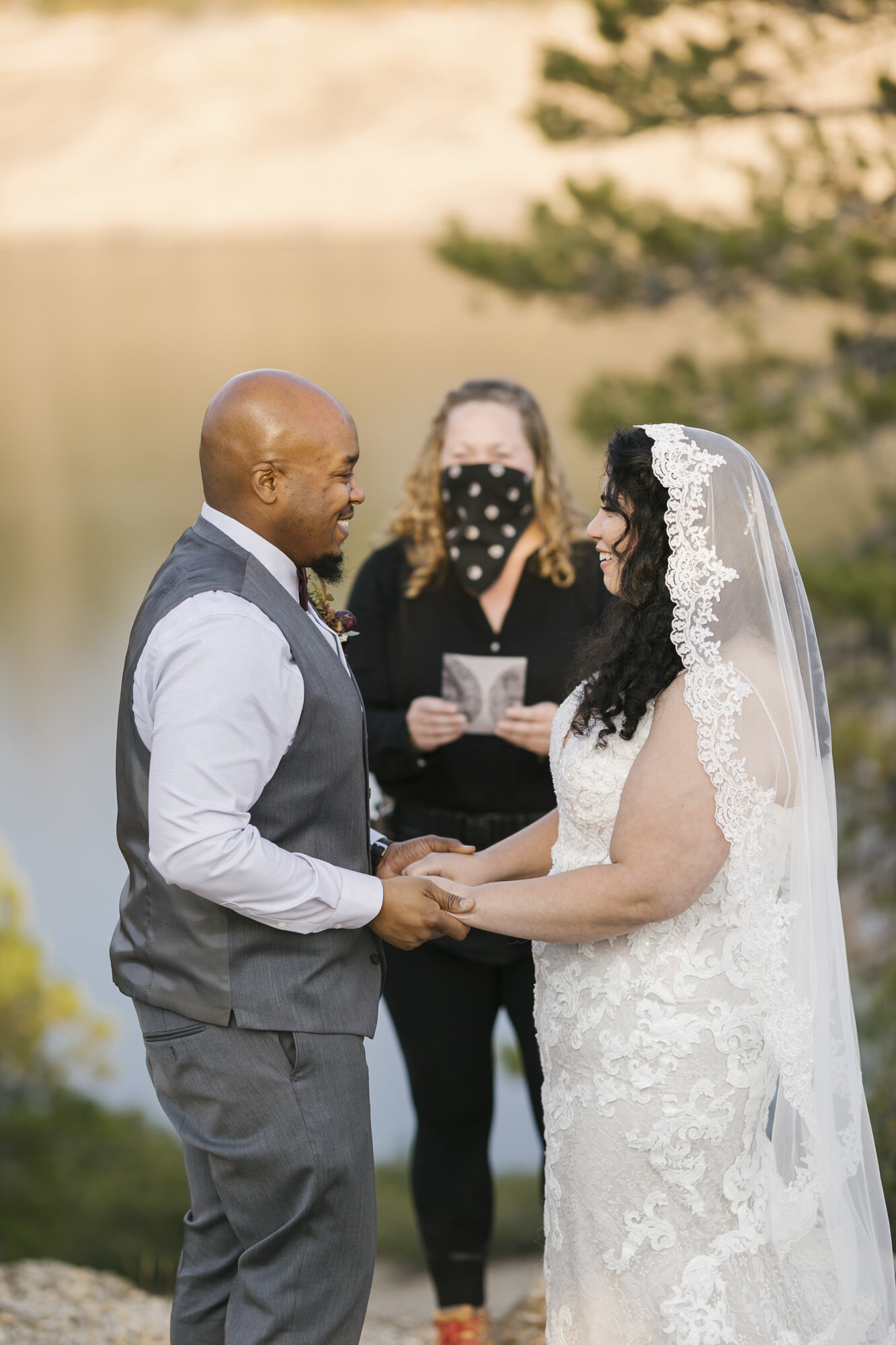 Wedding photographer Natalie Ngo steps in as officiant to pronounce the bride and groom married in the Tahoe forest in California