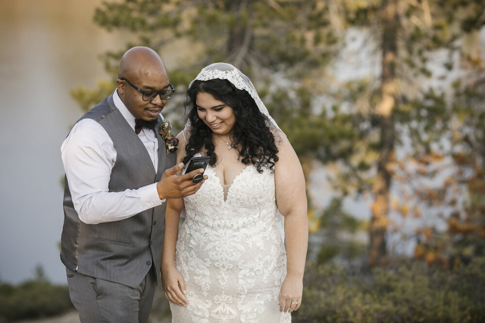 Wedding couple share their just married excitement with their families over Zoom