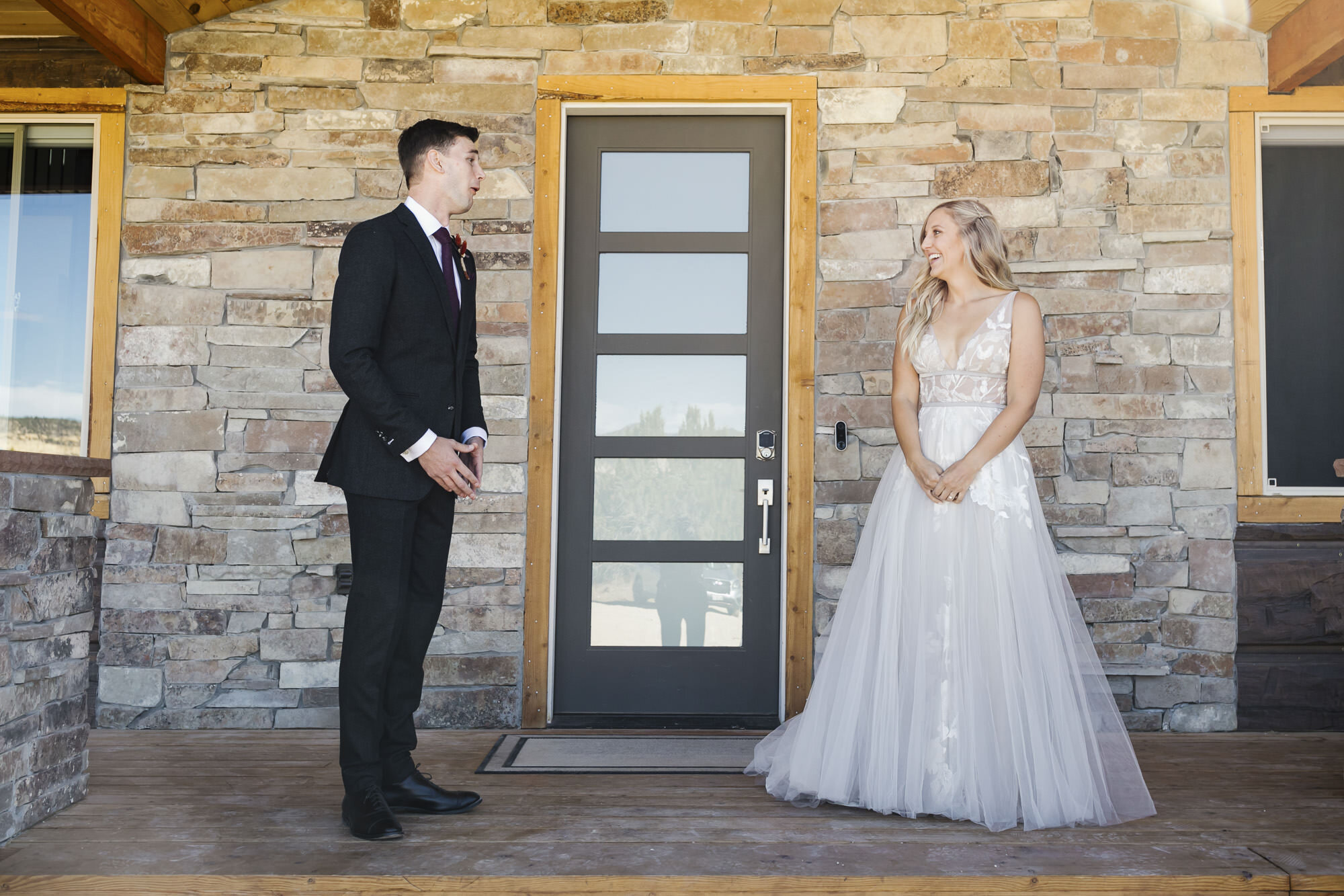 Groom reacts to seeing his bride for the first time on the wedding day in Utah