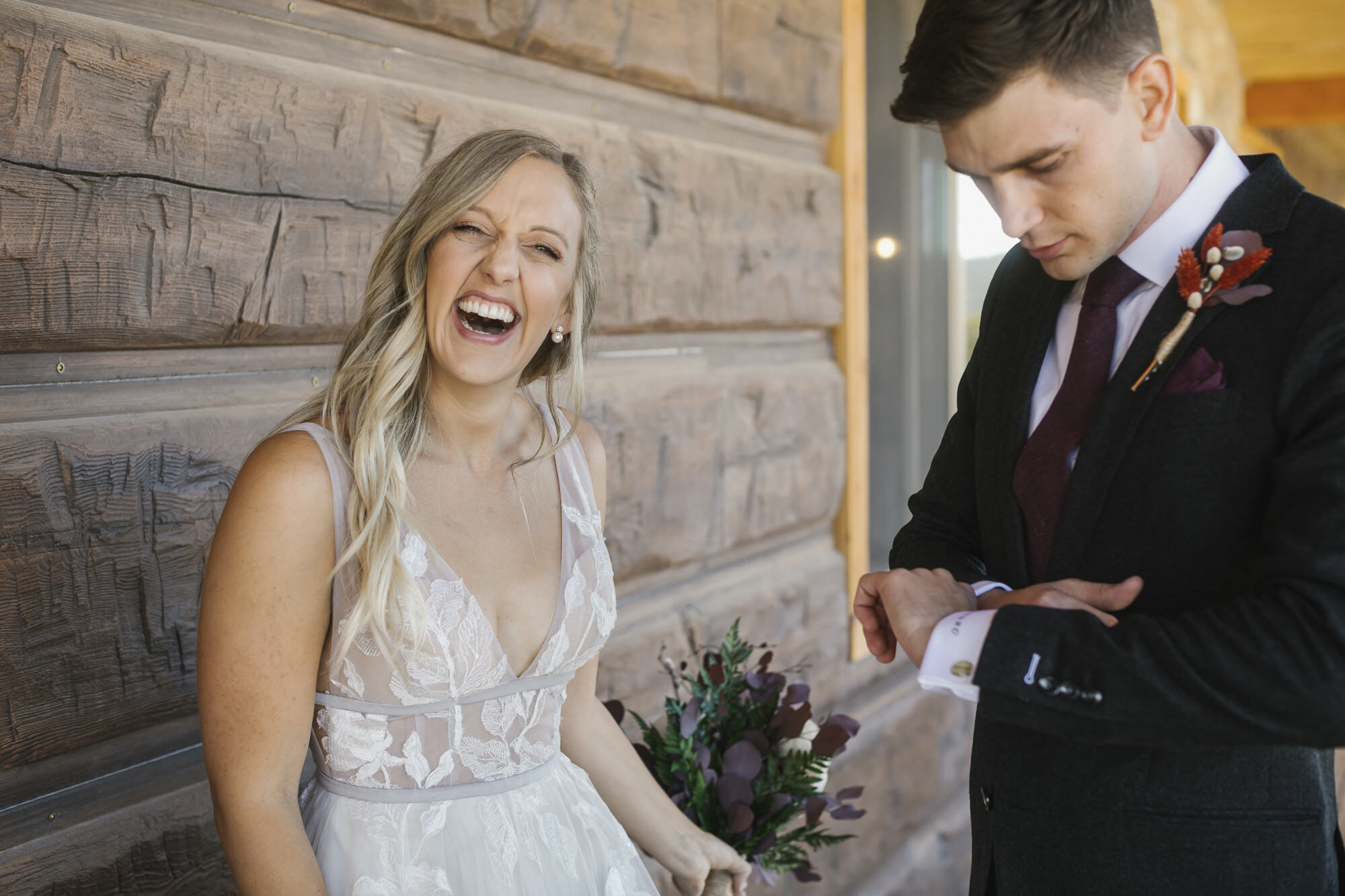 Bride laughs at her adorable groom