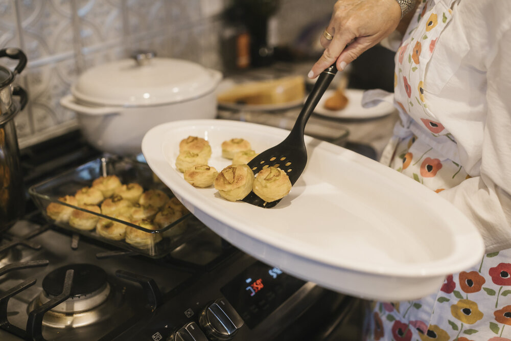 Bride's mom plating up some delicious canapes for her daughter's wedding reception