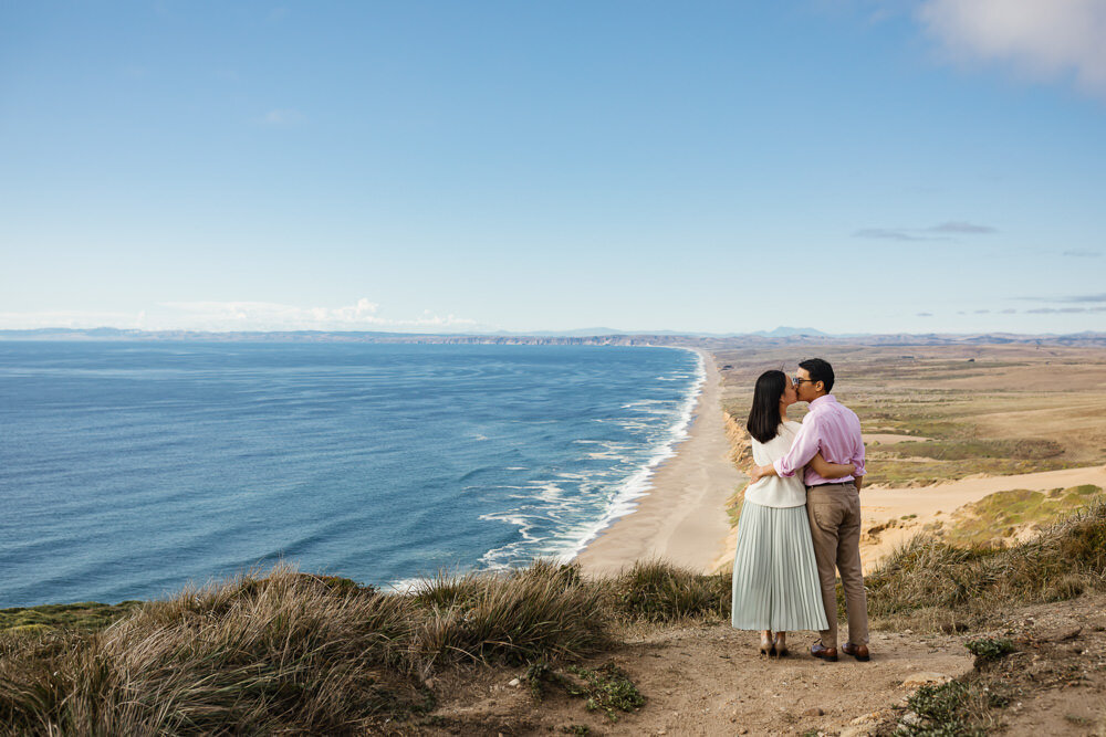 Point Reyes couple kiss with spectacular ocean view 